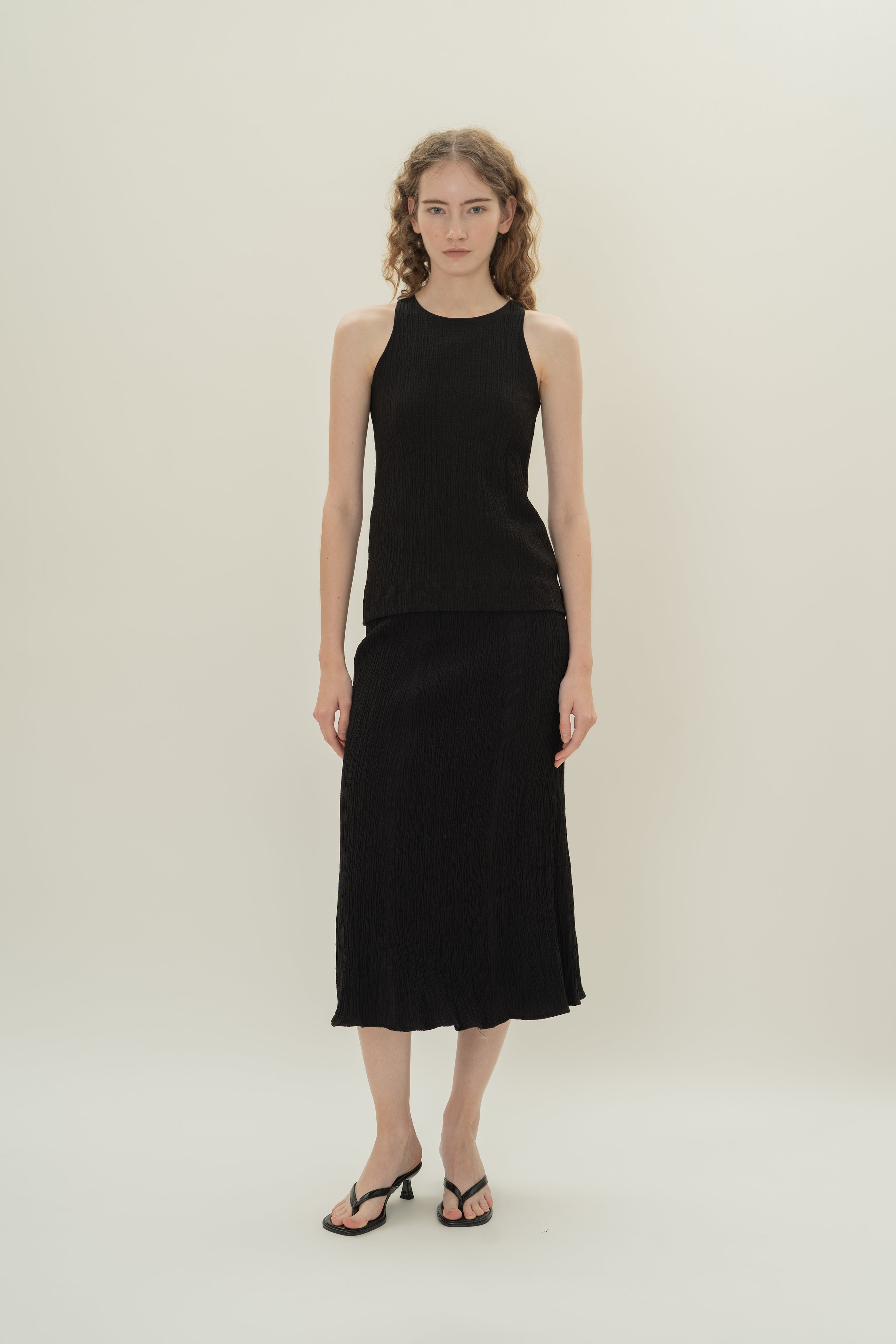 Cotton Blend Textured Round Neck Top in Black