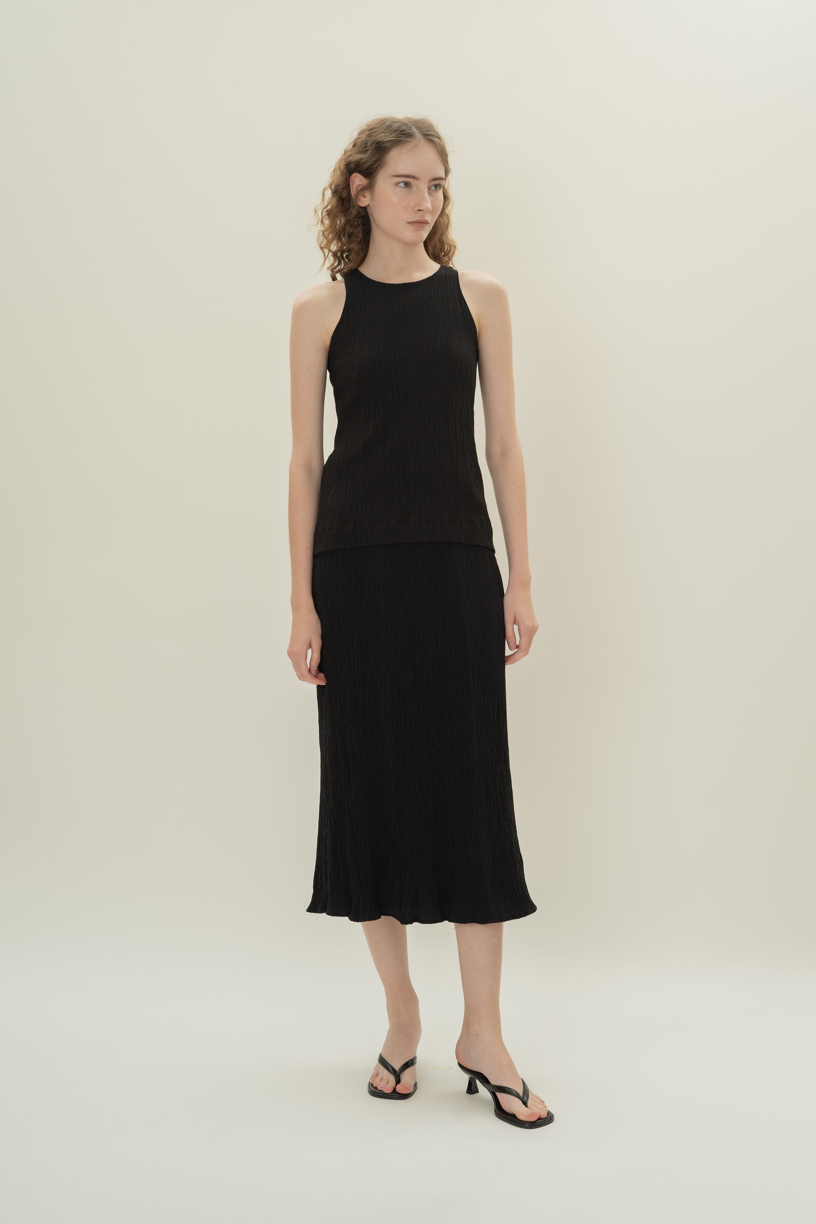 Cotton Blend Textured Round Neck Top in Black