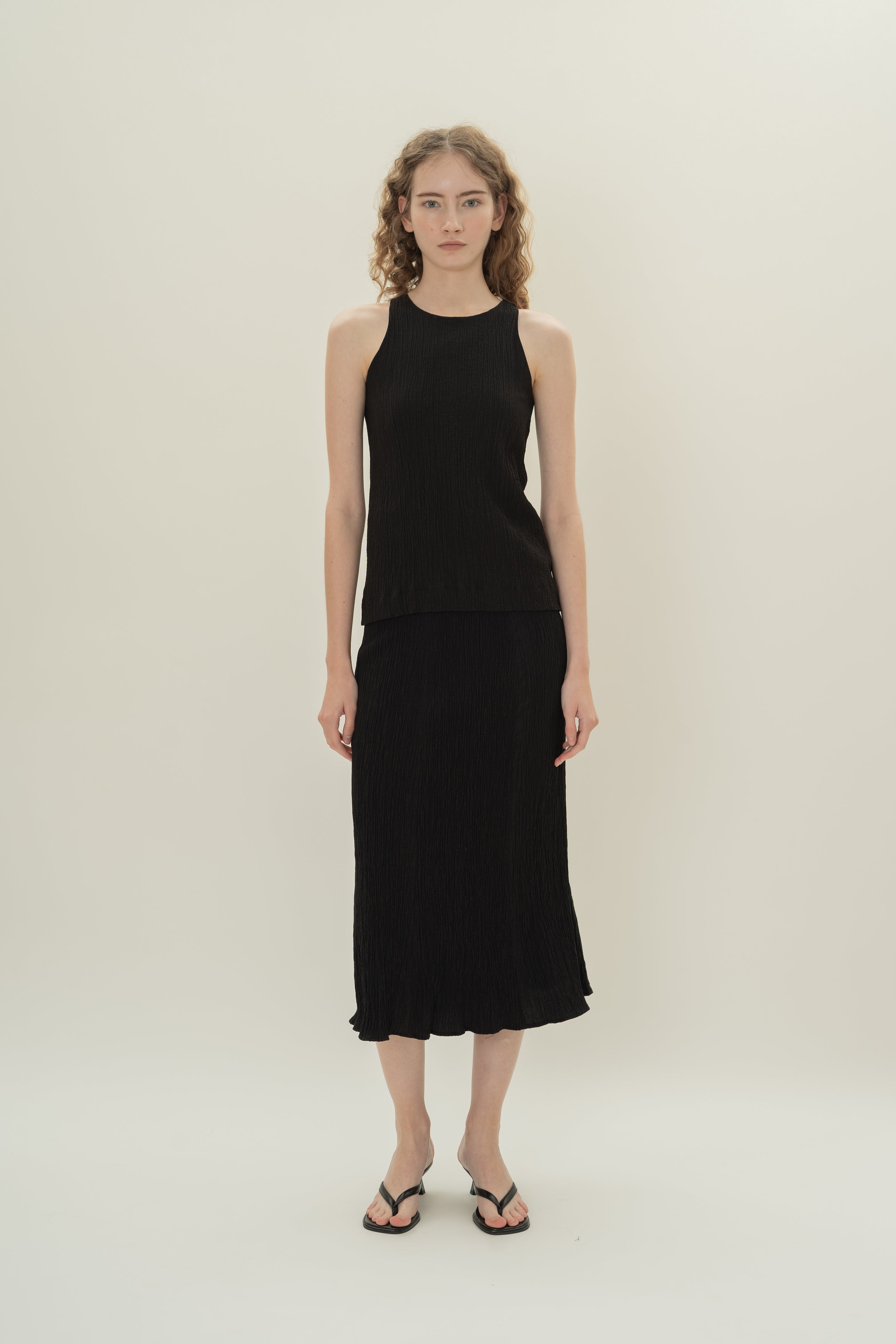 Cotton Blend Textured Round Neck Top in Black