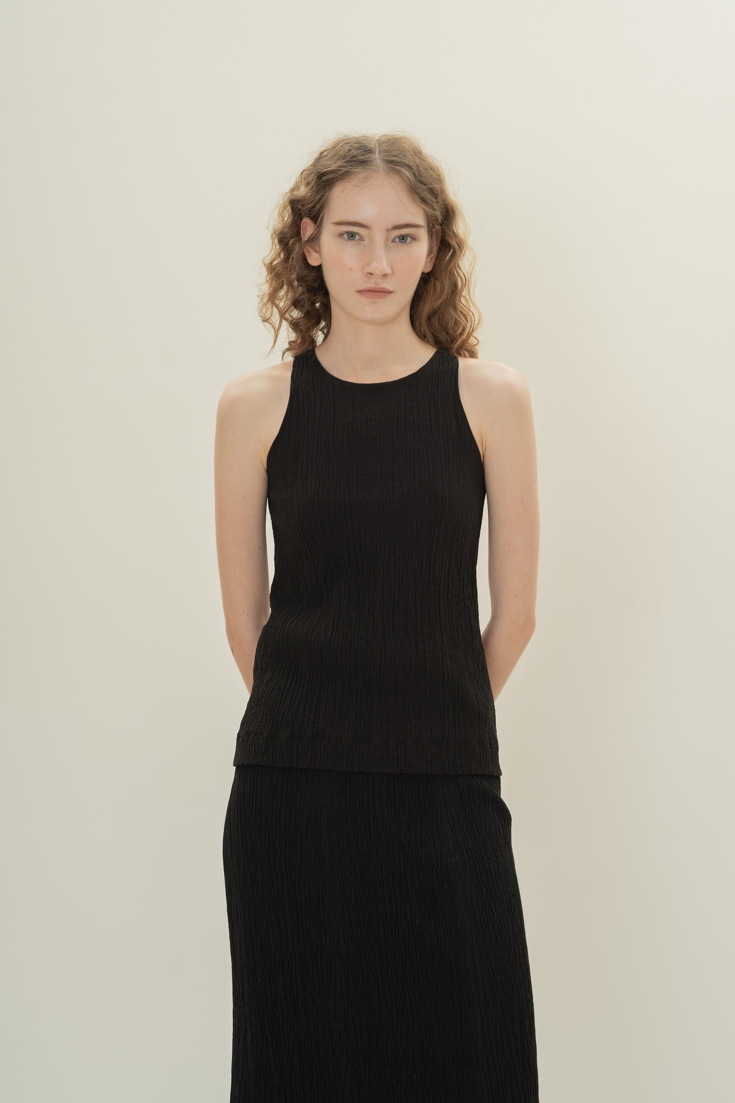 Cotton Blend Textured Round Neck Top in Black