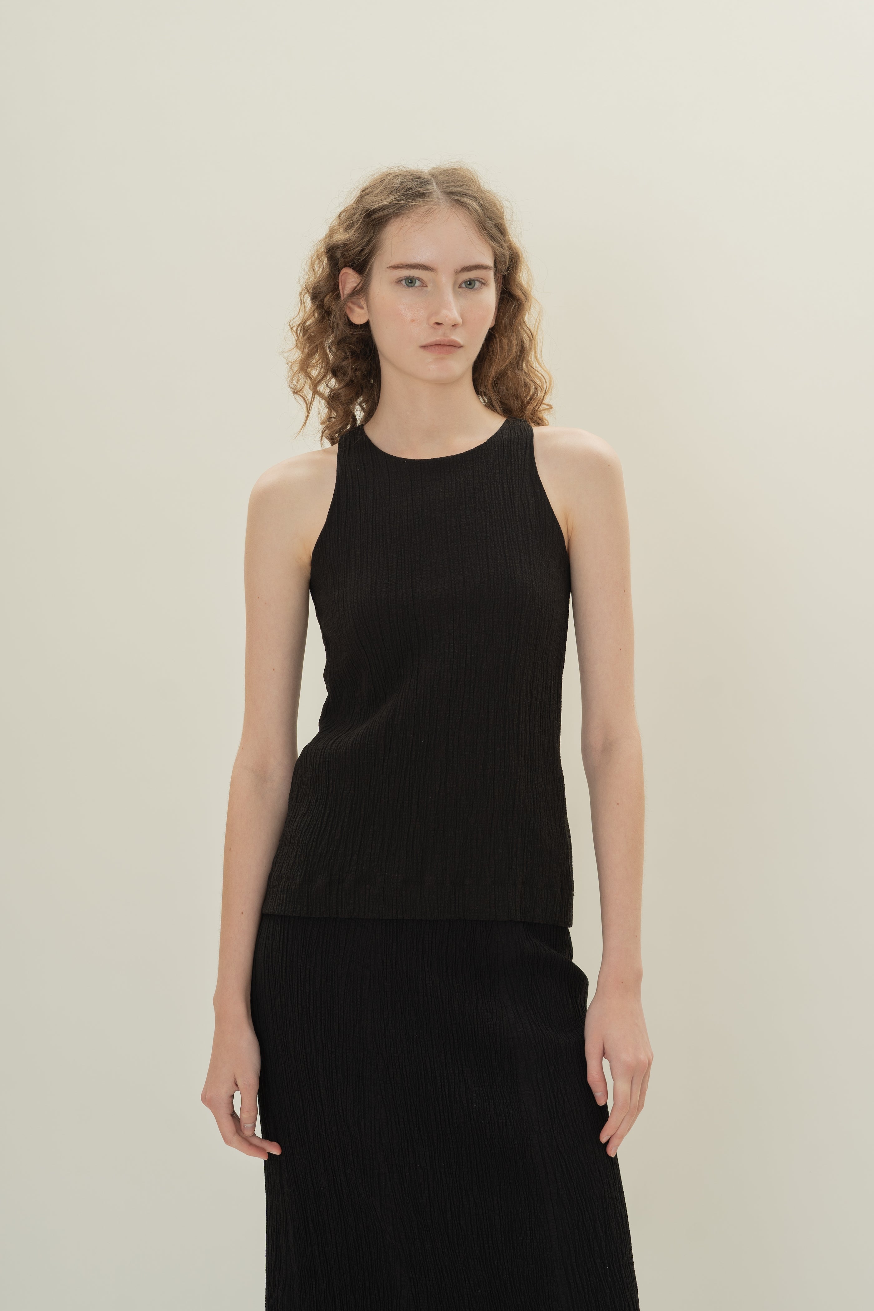 Cotton Blend Textured Round Neck Top in Black