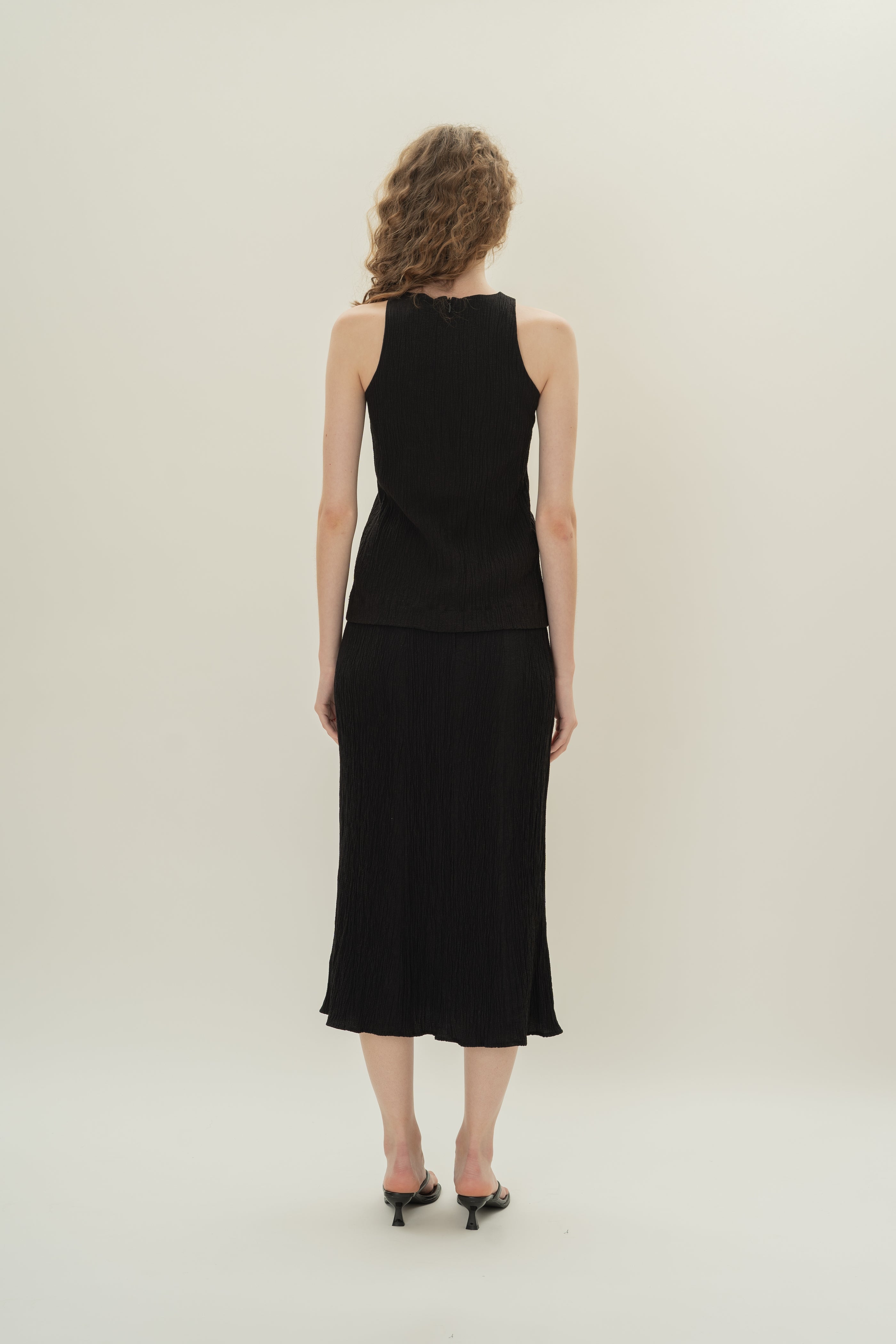 Cotton Blend Textured Round Neck Top in Black
