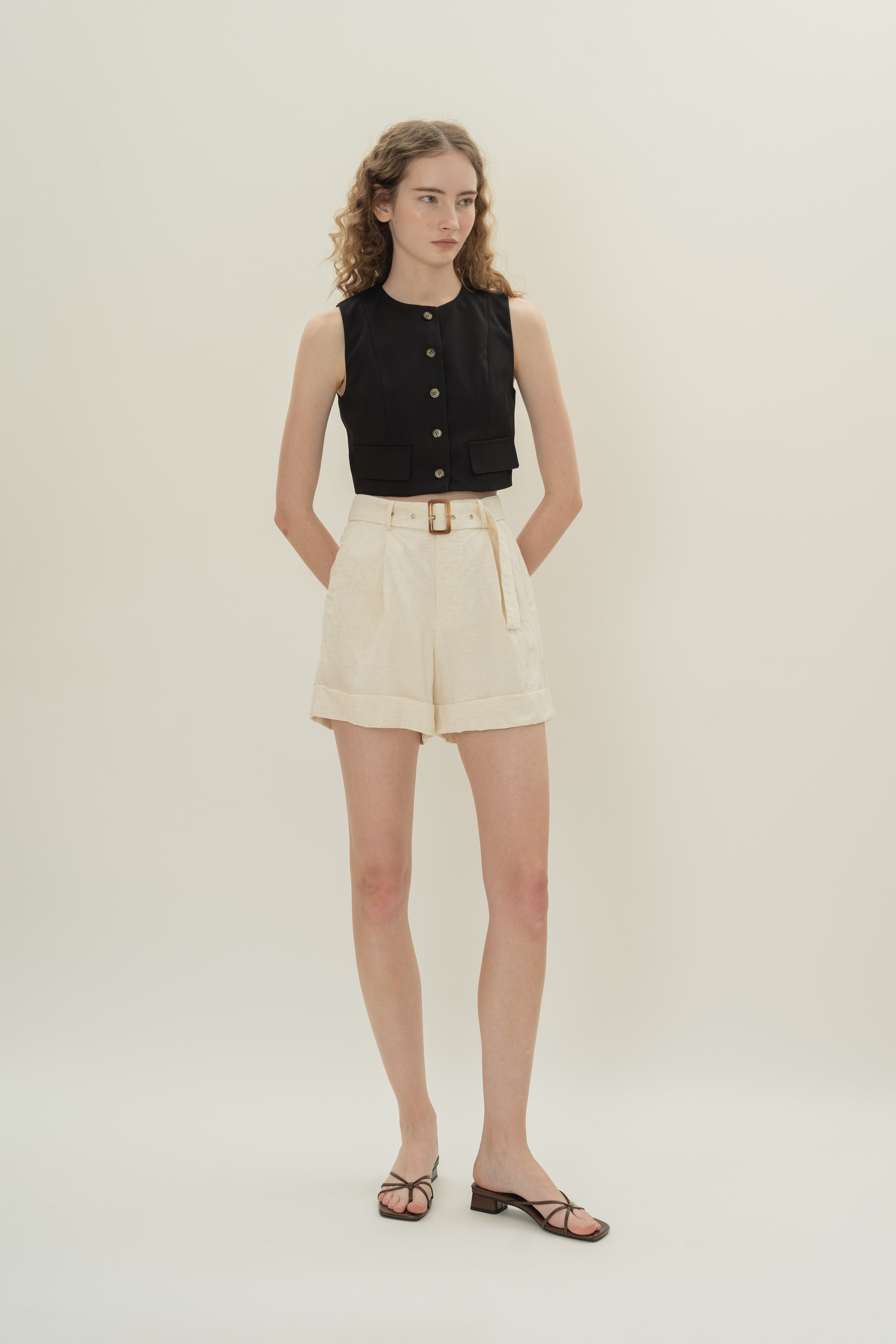 Collarless Sleeveless Top in Black
