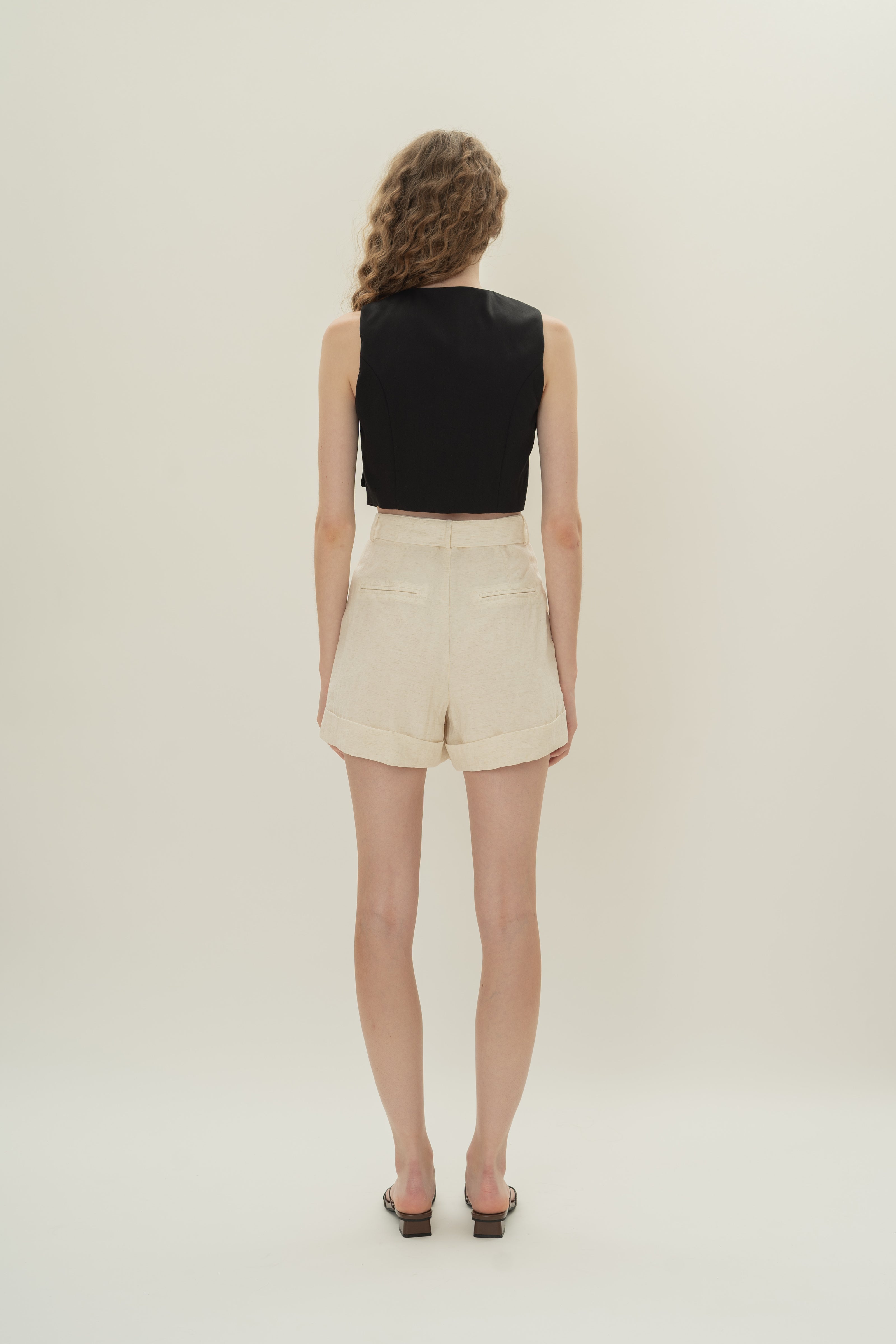 Collarless Sleeveless Top in Black