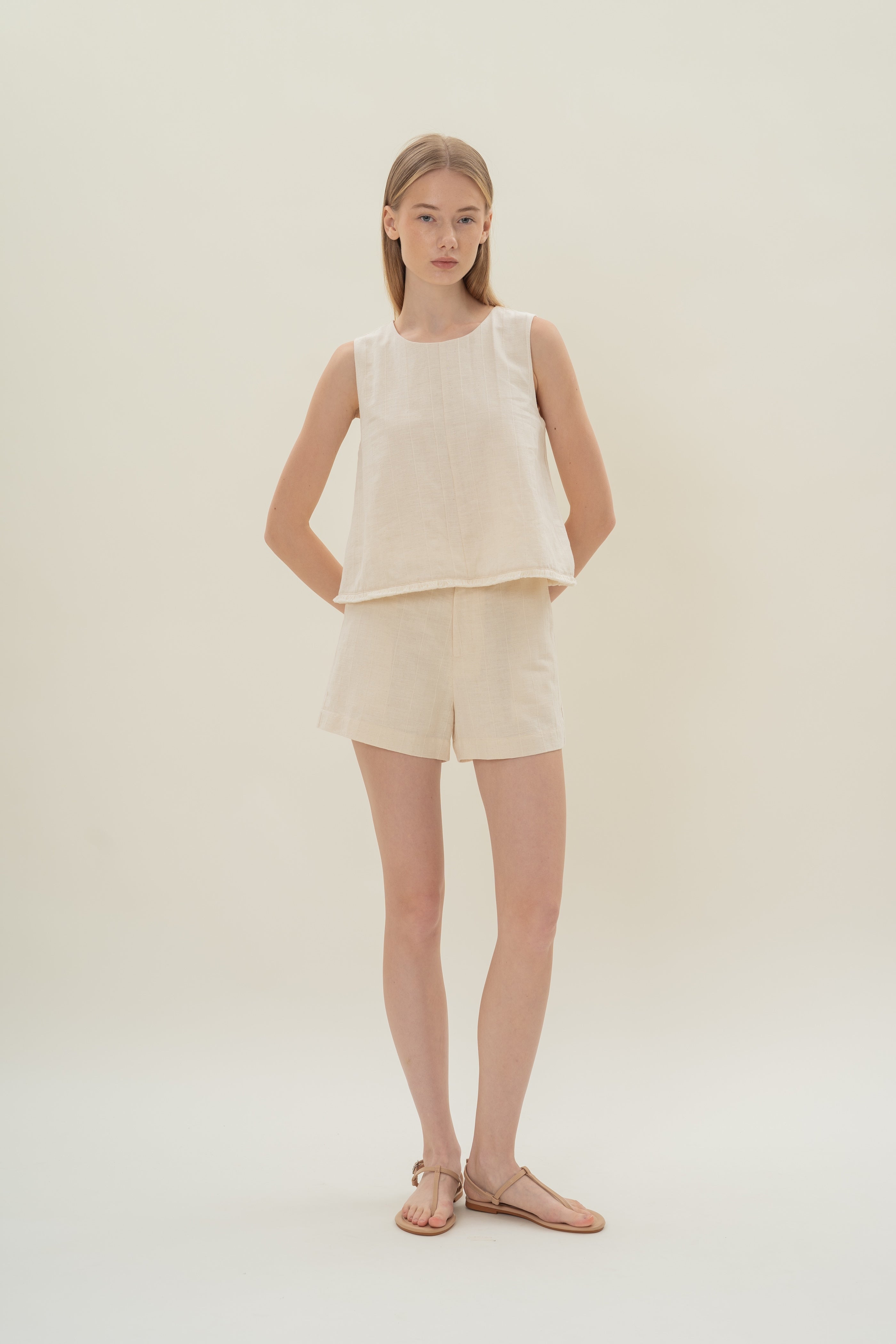 Frilled Hem Sleeveless A-Line Top in Natural