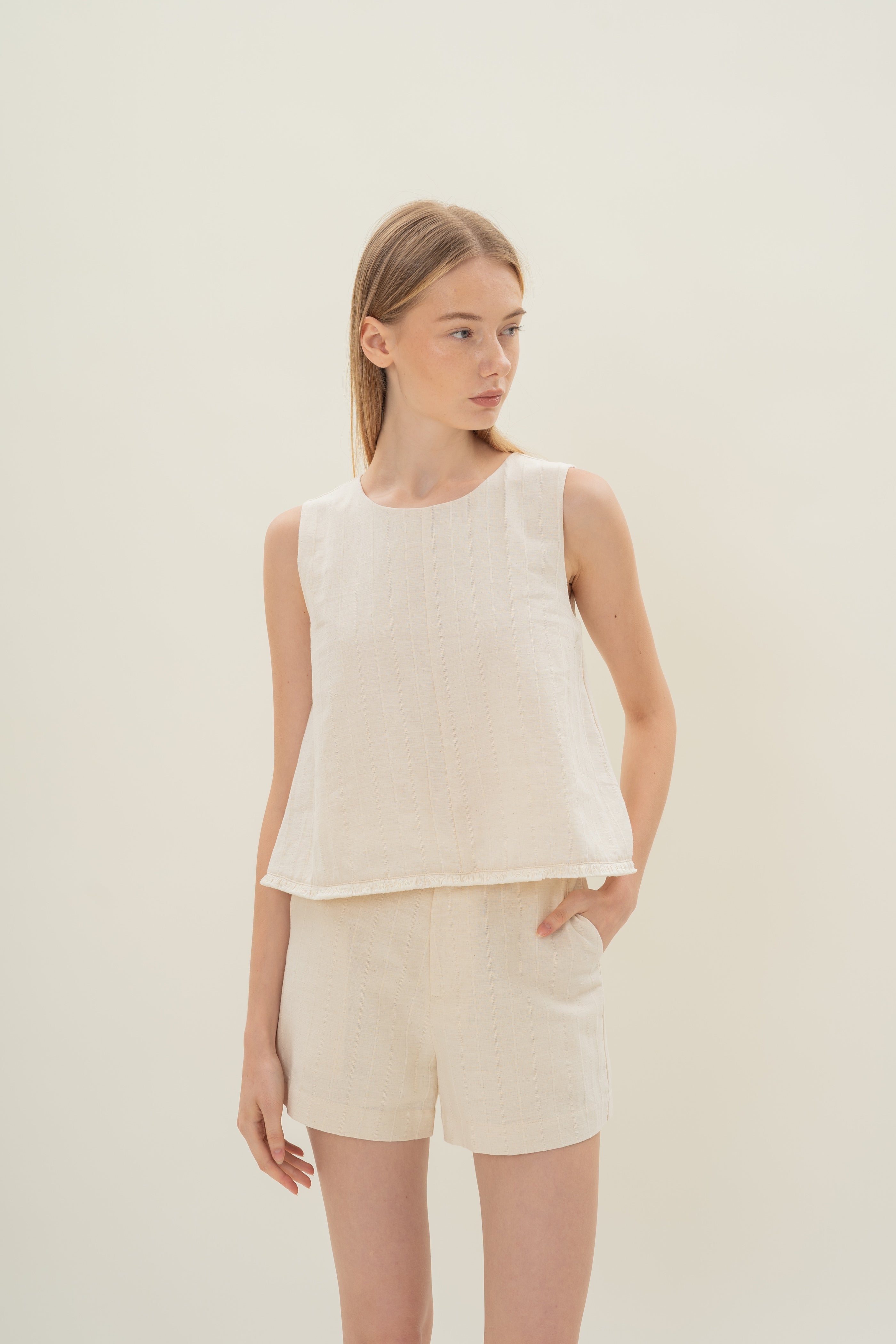 Frilled Hem Sleeveless A-Line Top in Natural