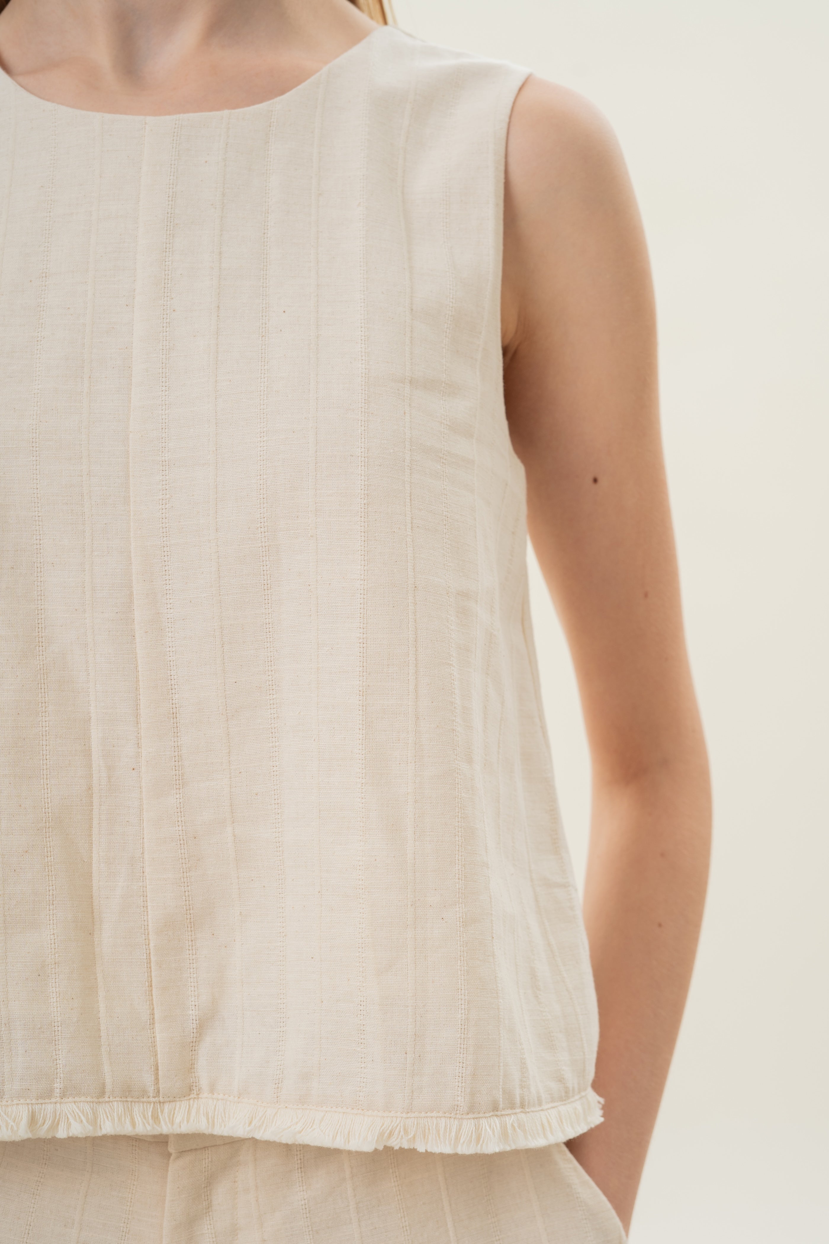 Frilled Hem Sleeveless A-Line Top in Natural
