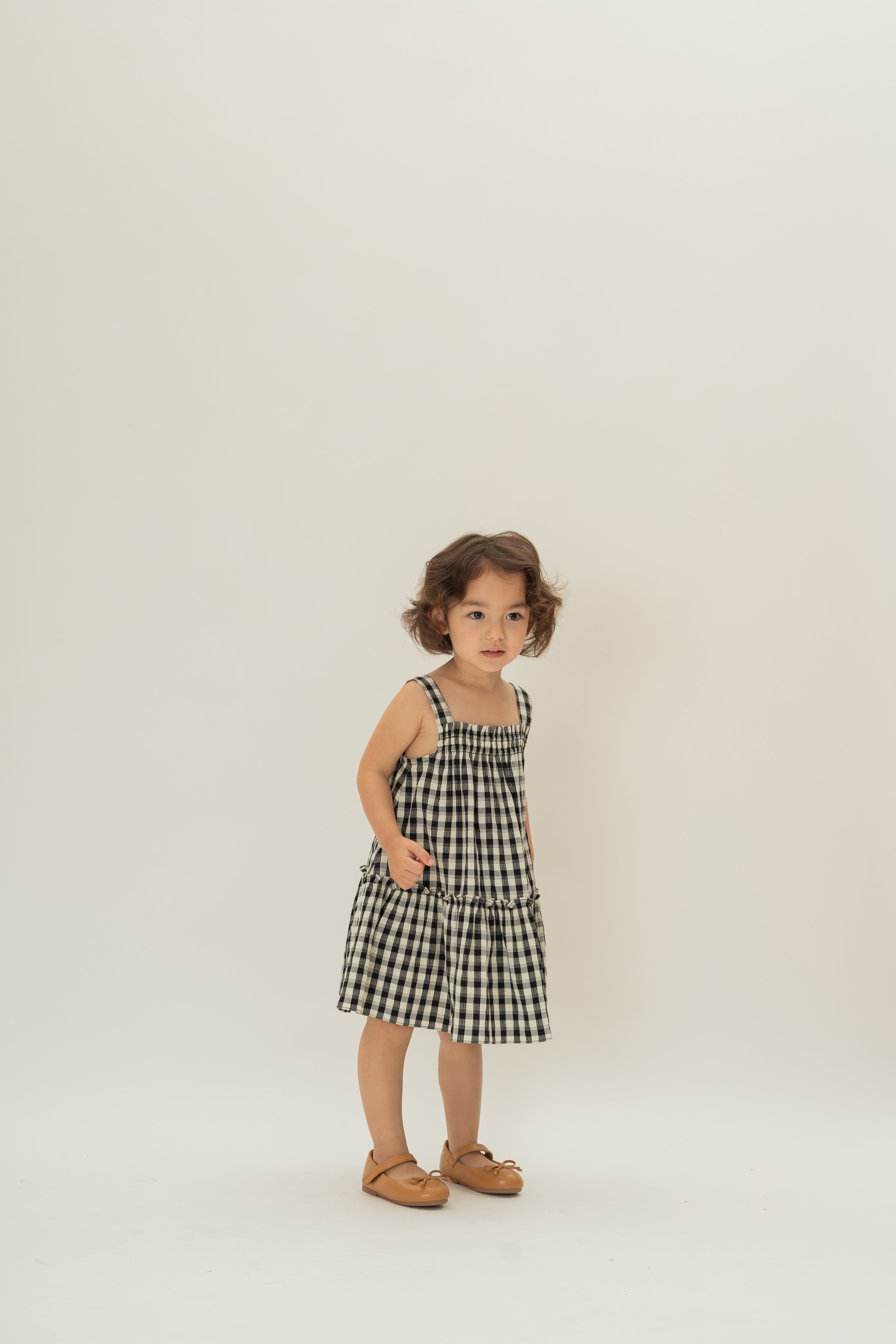 Mini Frilled Tiered Dress in Black Gingham