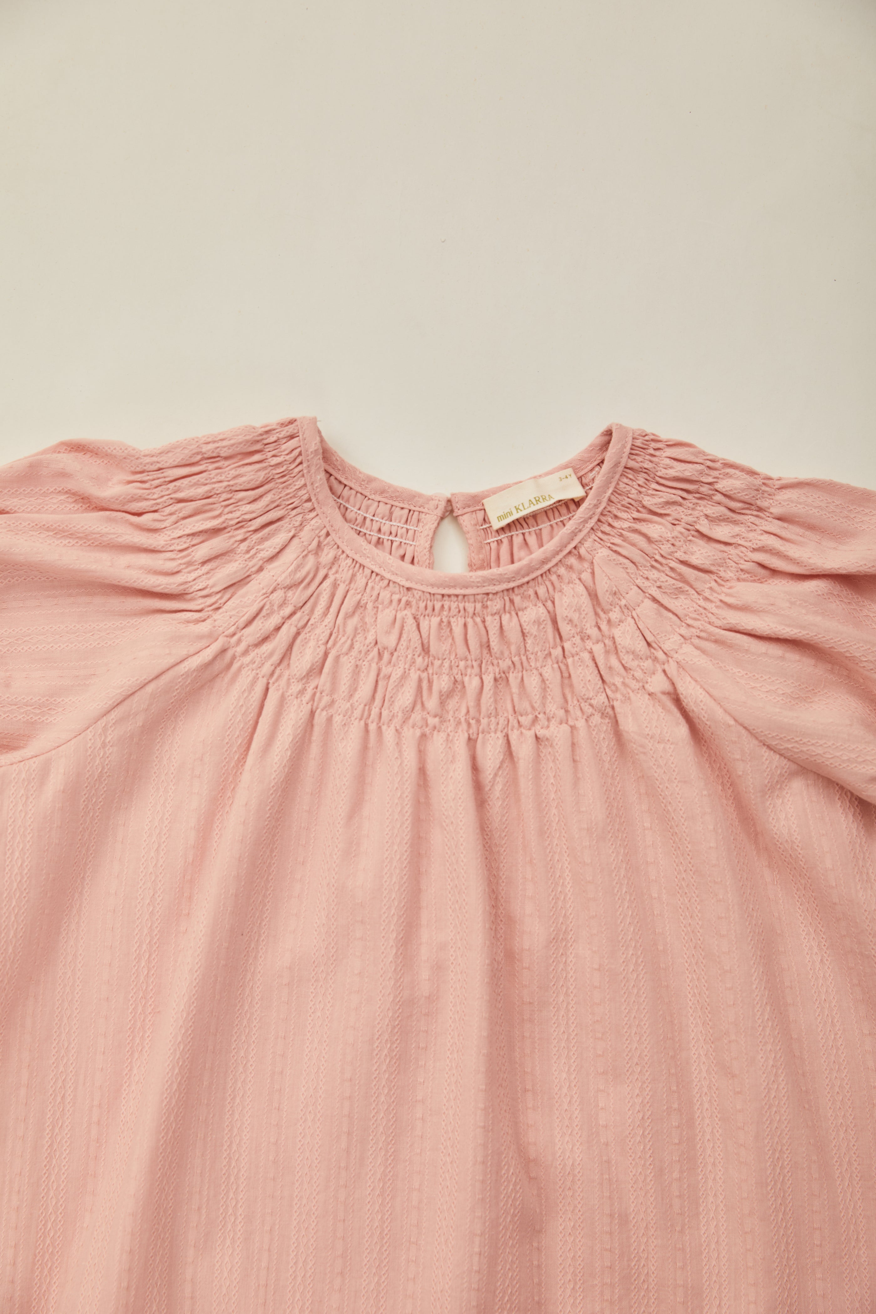 Mini Puffed Sleeve Shirred Neckline Dress in Petal Pink