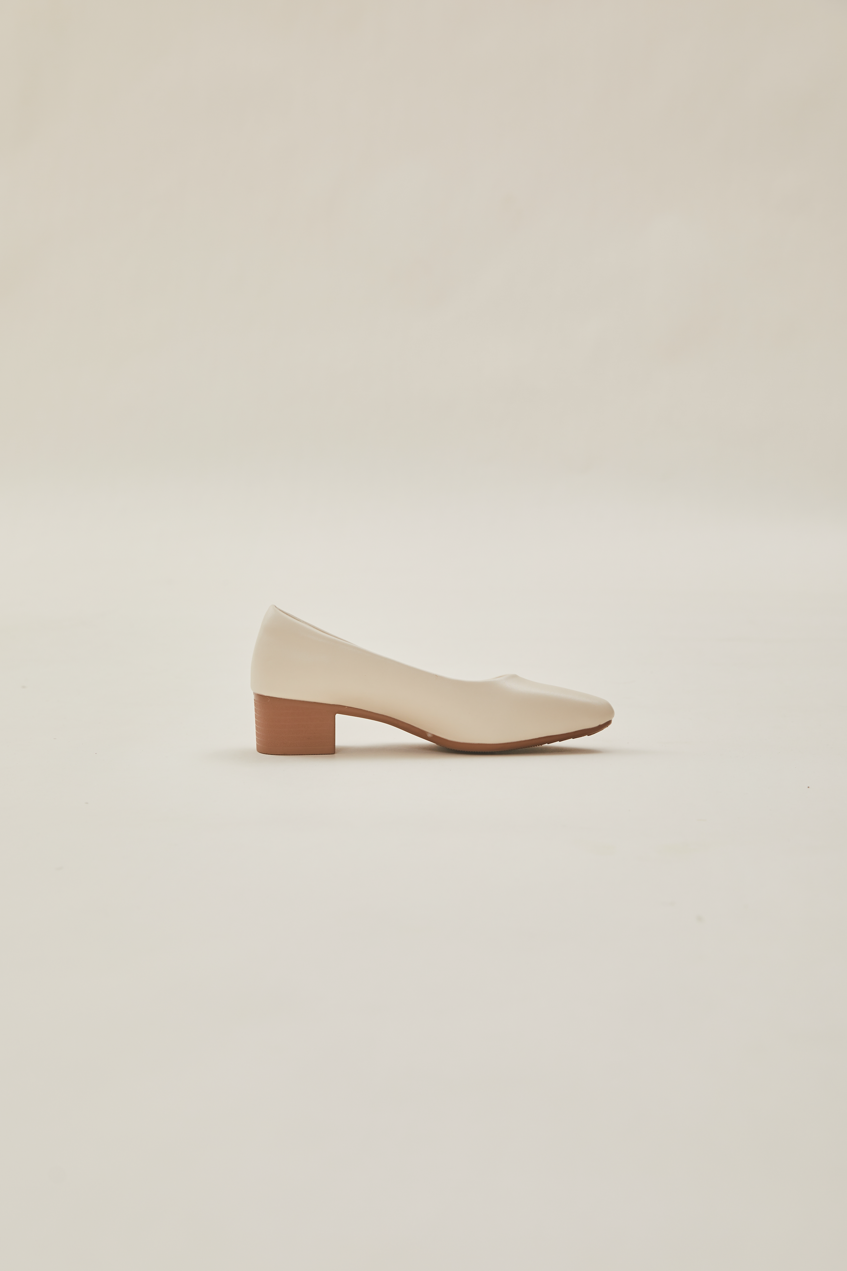 Rea Square Toe Pumps in Cream