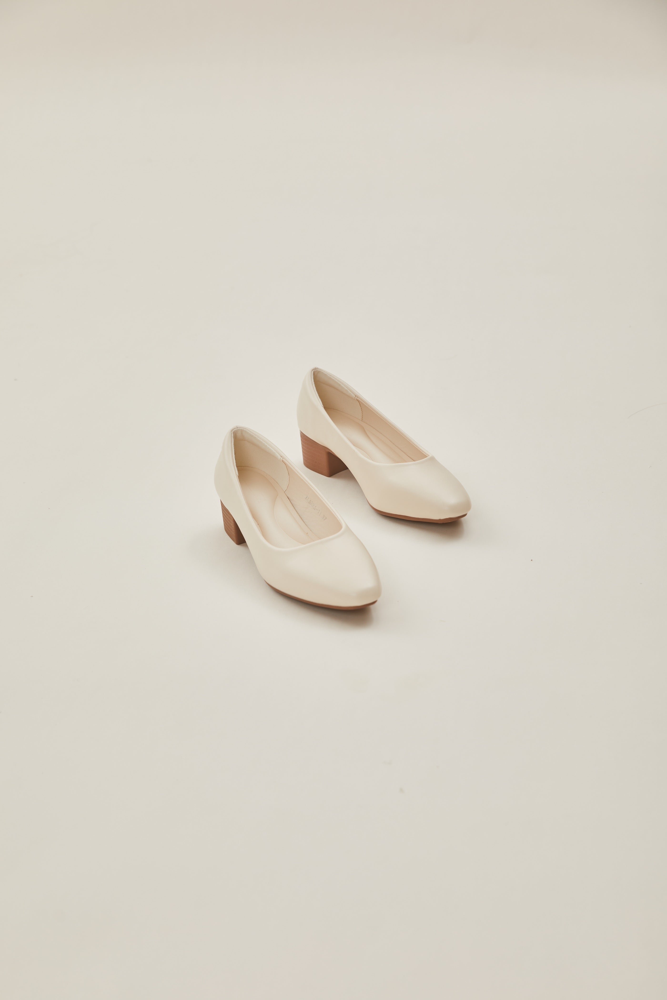 Rea Square Toe Pumps in Cream