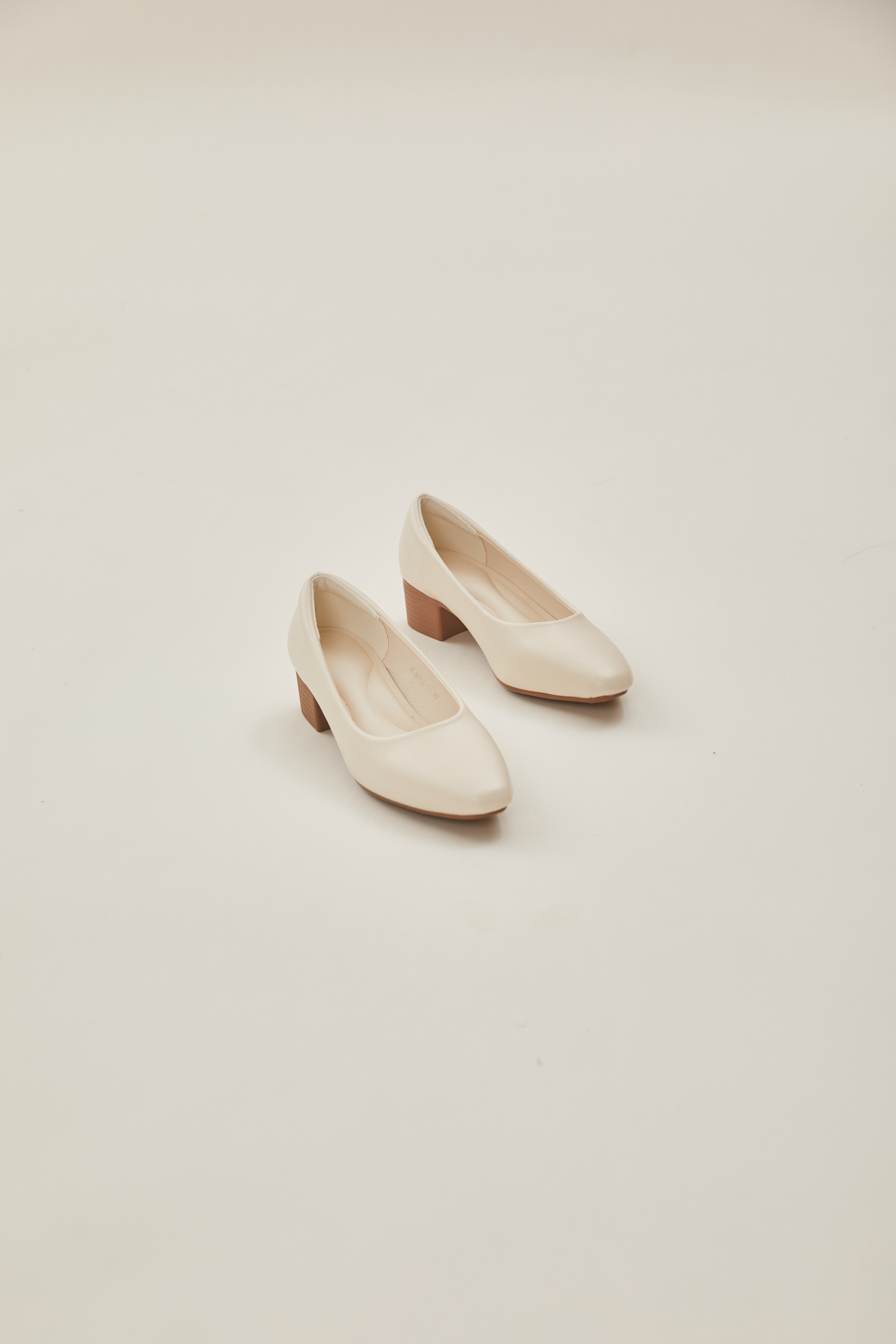 Rea Square Toe Pumps in Cream