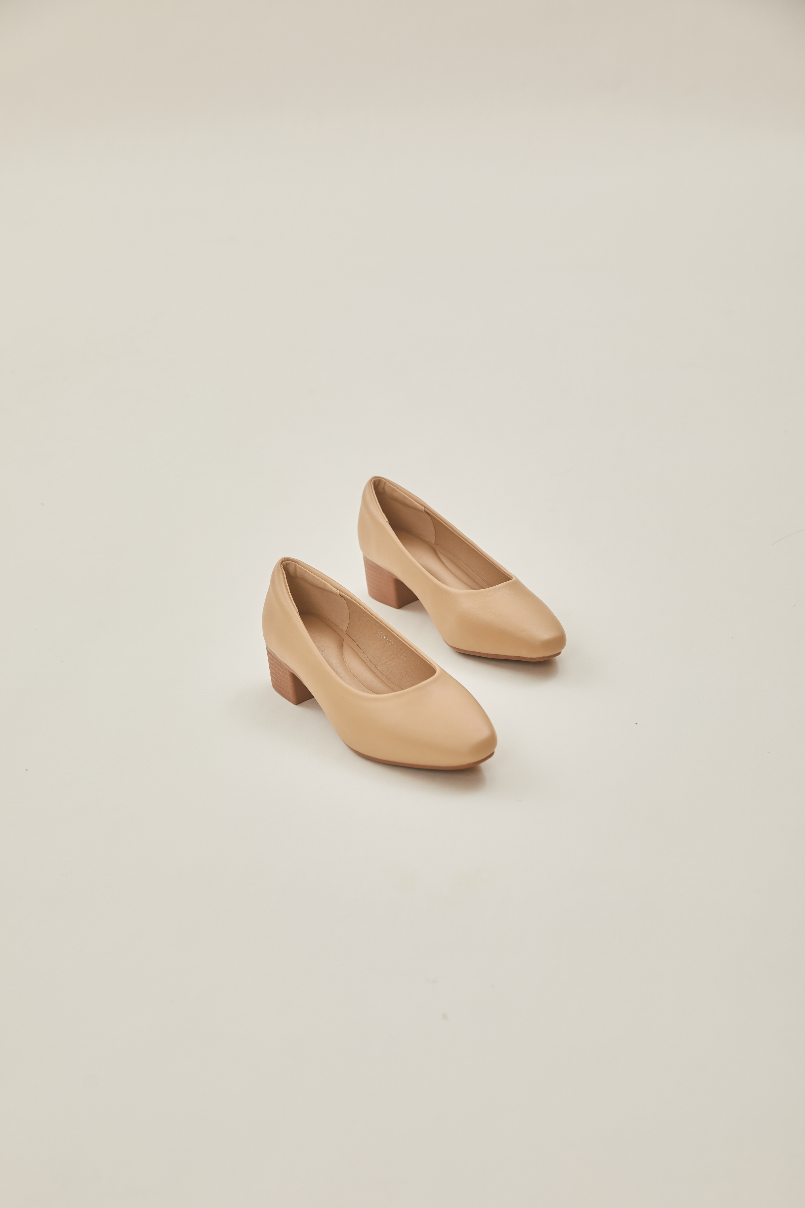 Rea Square Toe Pumps in Beige