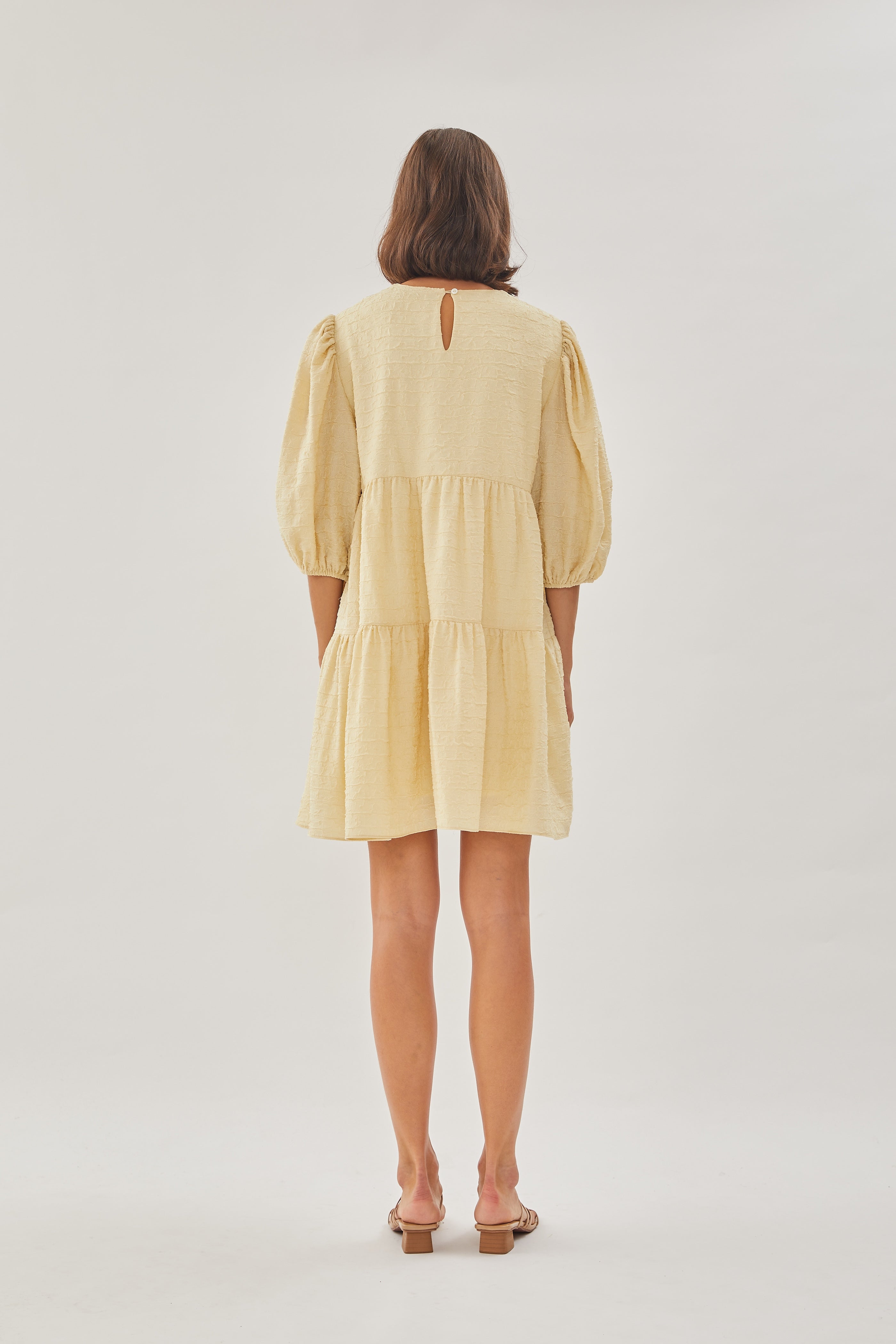 Textured Puffed Sleeved Mini Dress in Yellow