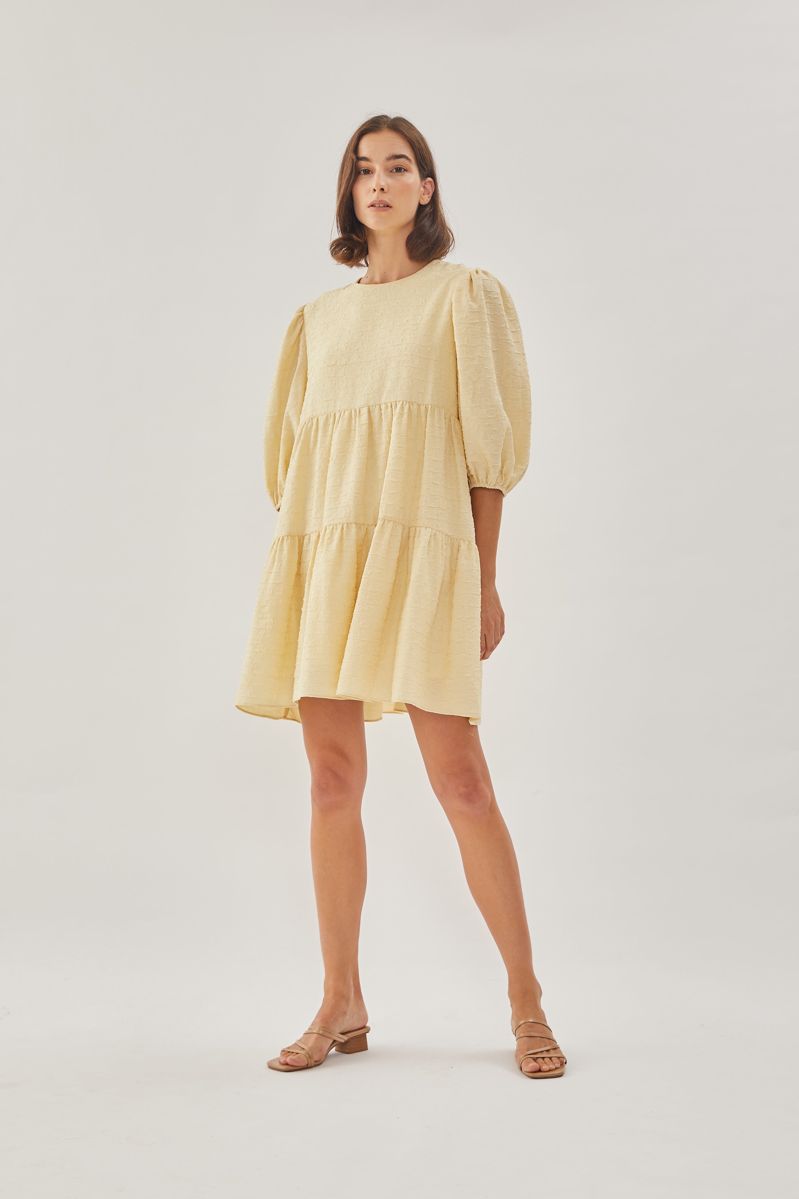 Textured Puffed Sleeved Mini Dress in Yellow
