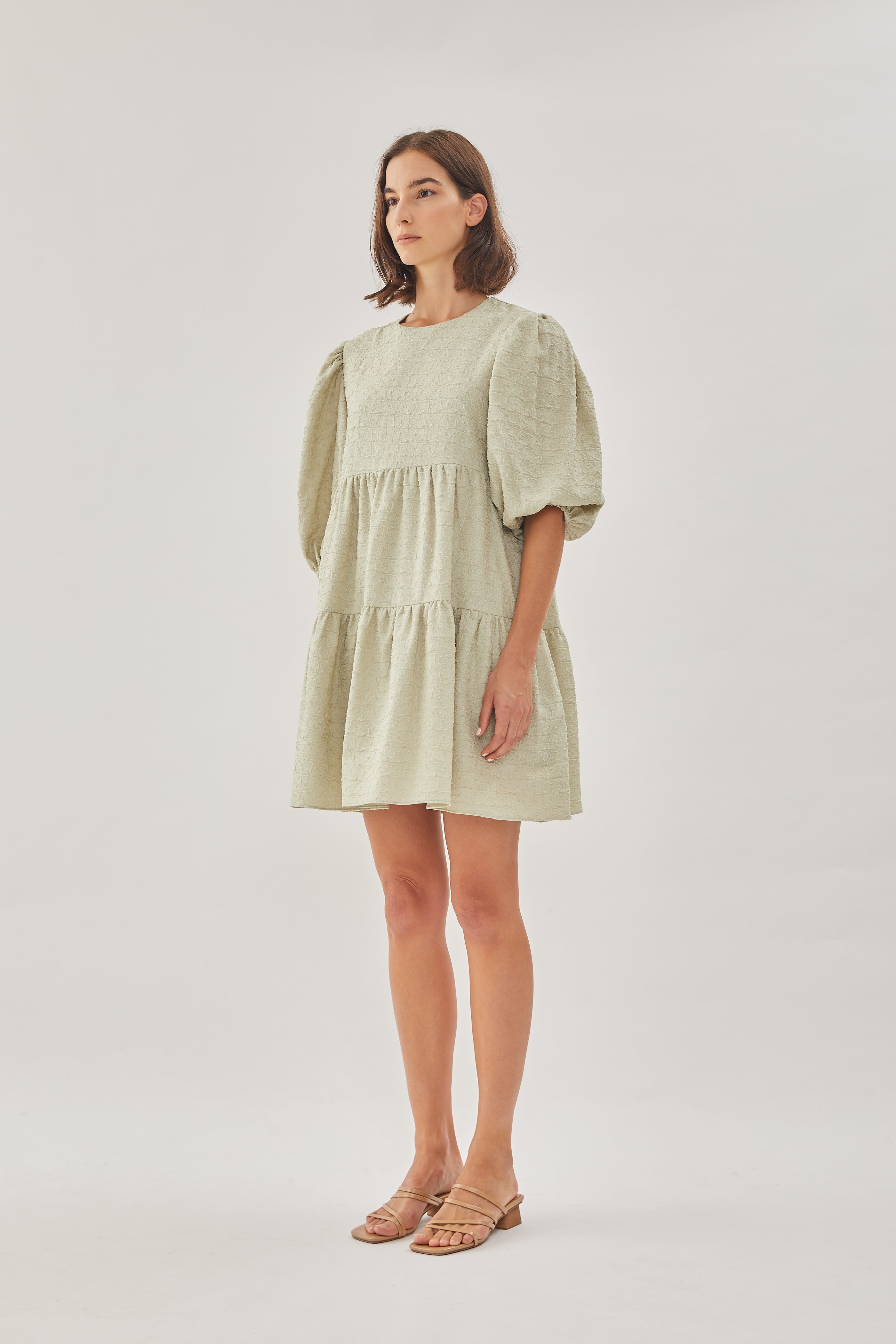 Textured Puffed Sleeved Mini Dress in Sea Mist