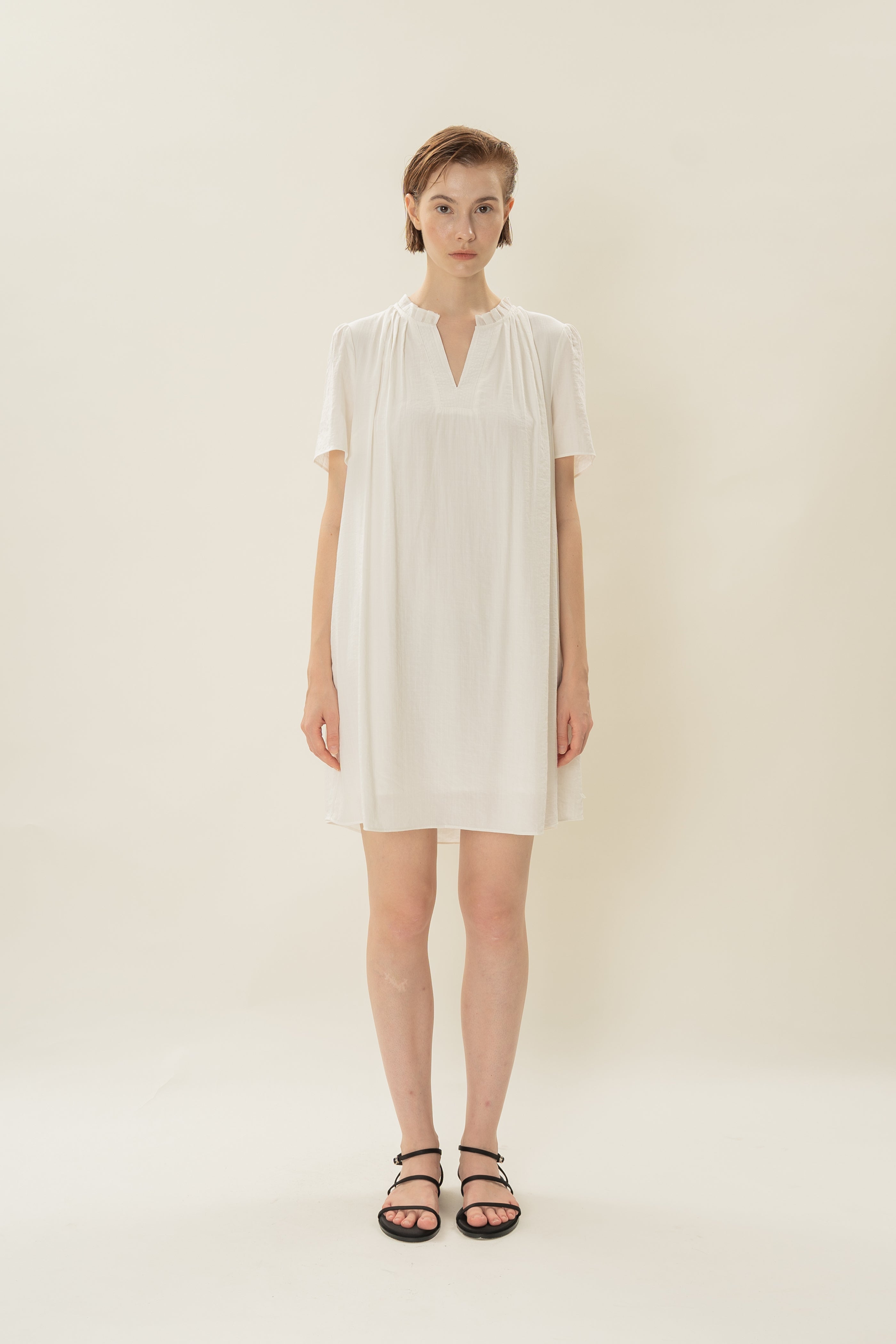 Pleated V Neck Dress in White