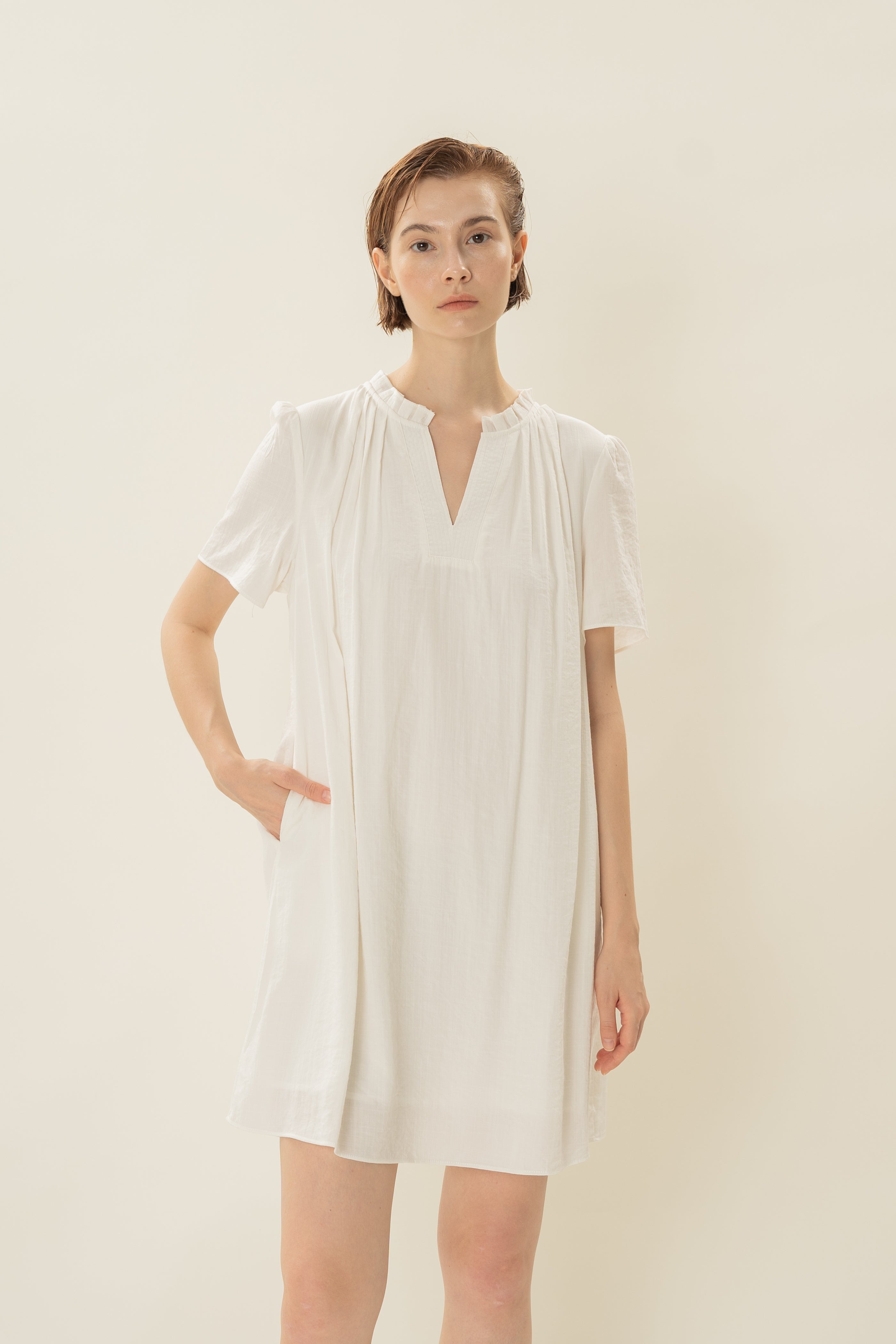 Pleated V Neck Dress in White