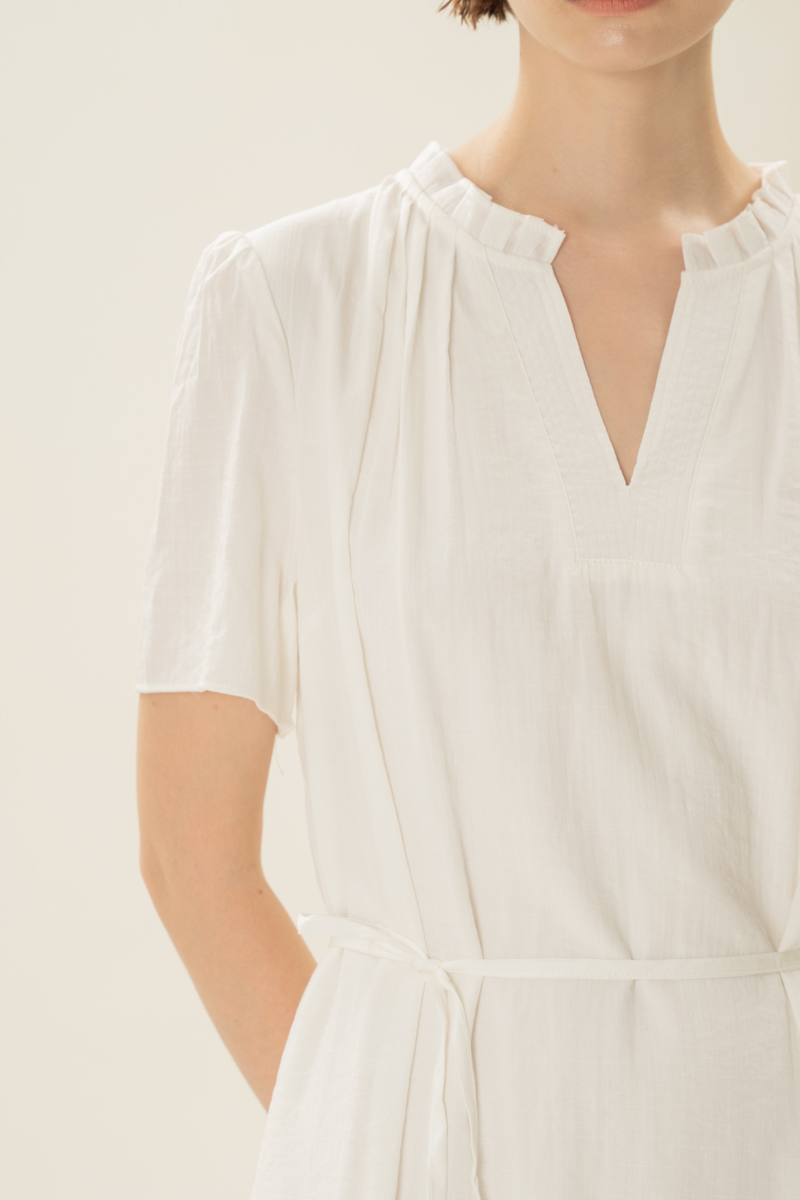 Pleated V Neck Dress in White