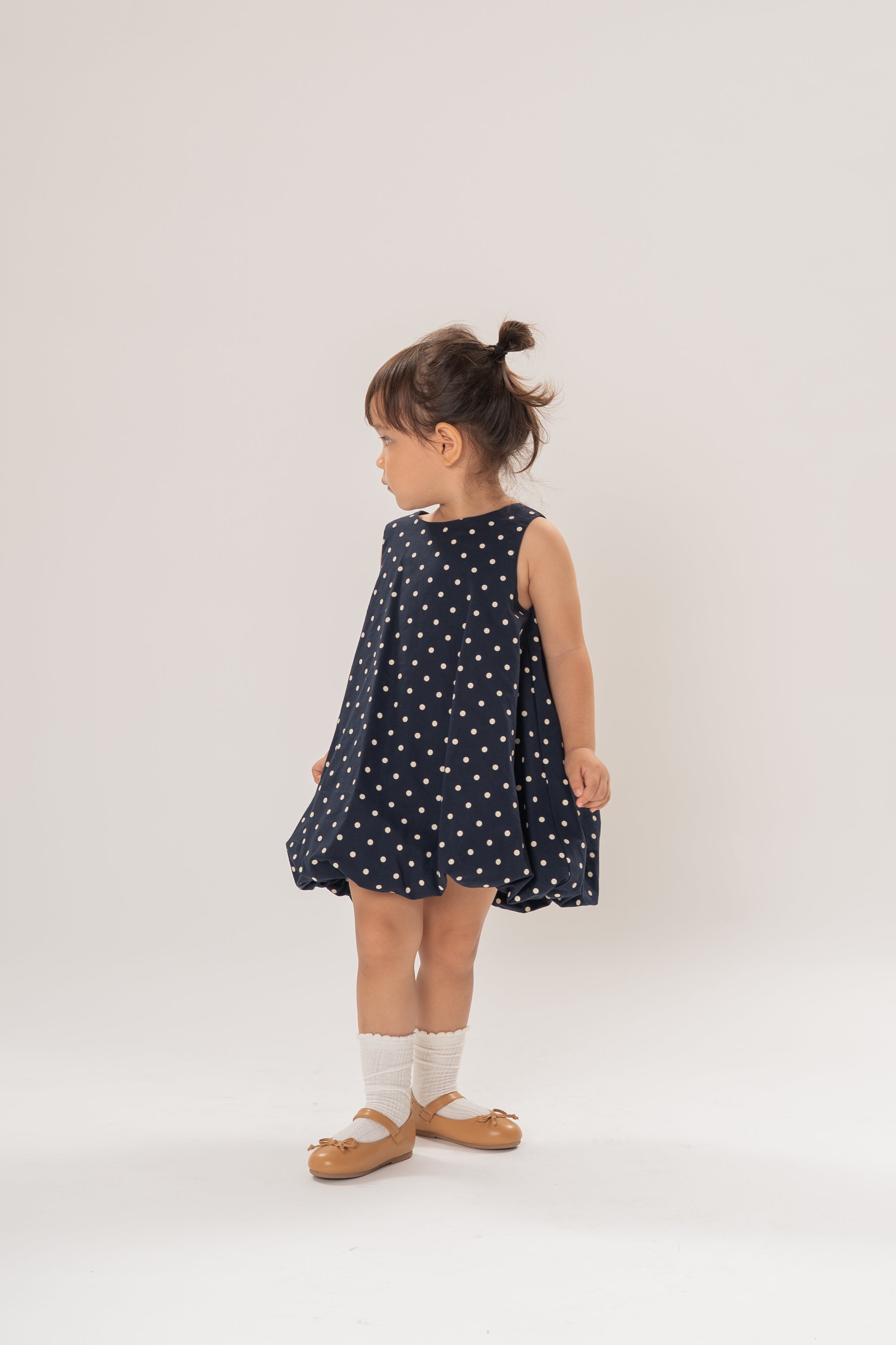 Mini Bubble Hem A-Line Dress in Polka Dot Navy