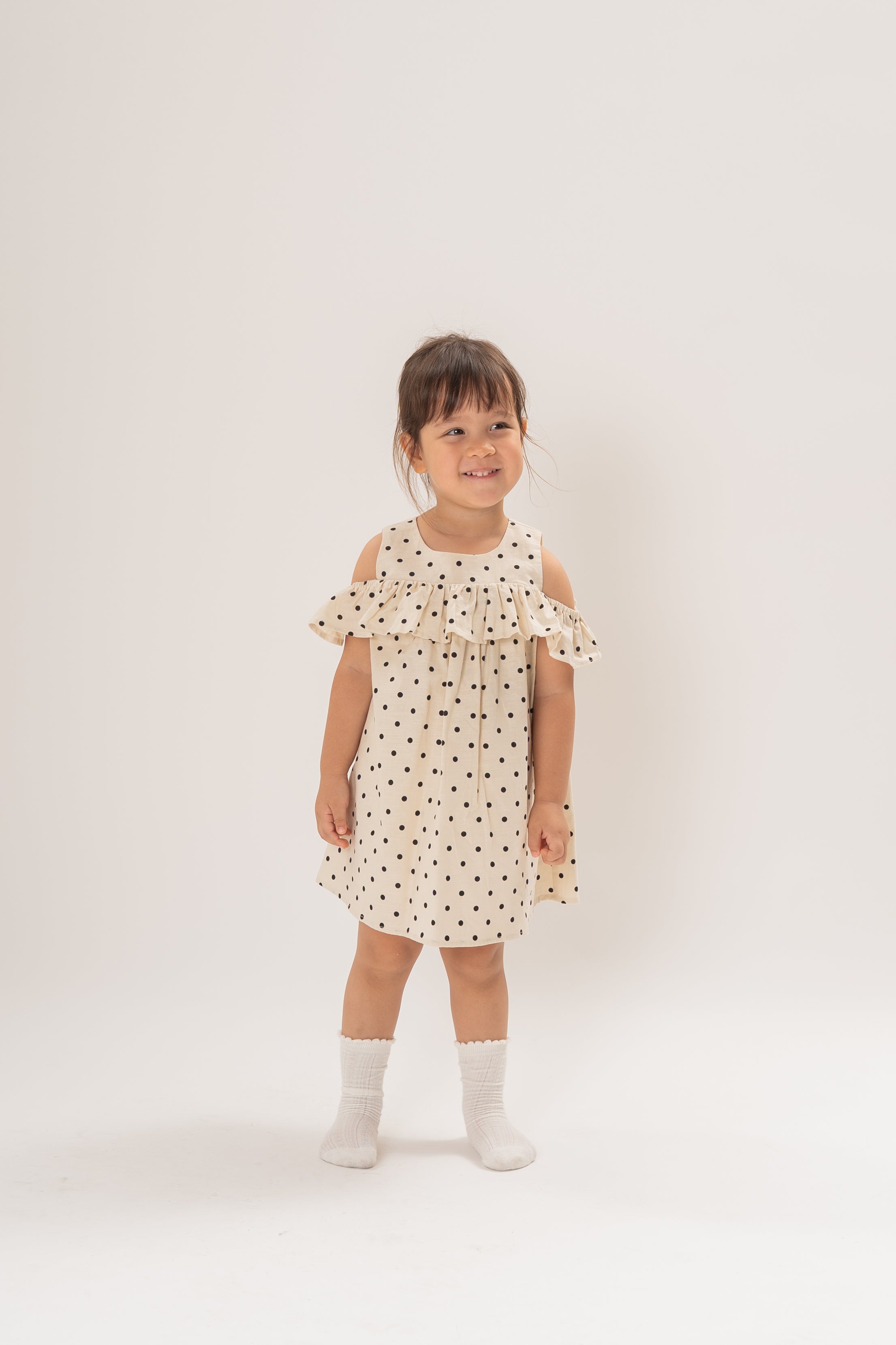 Mini Gathered Dress With Shoulder Detailing in Polka Dot Ivory