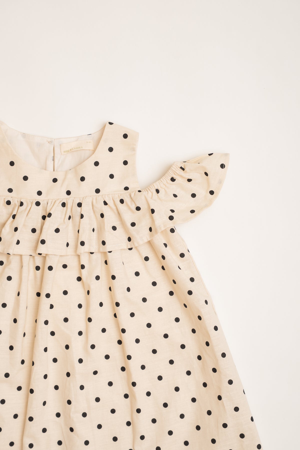 Mini Gathered Dress With Shoulder Detailing in Polka Dot Ivory