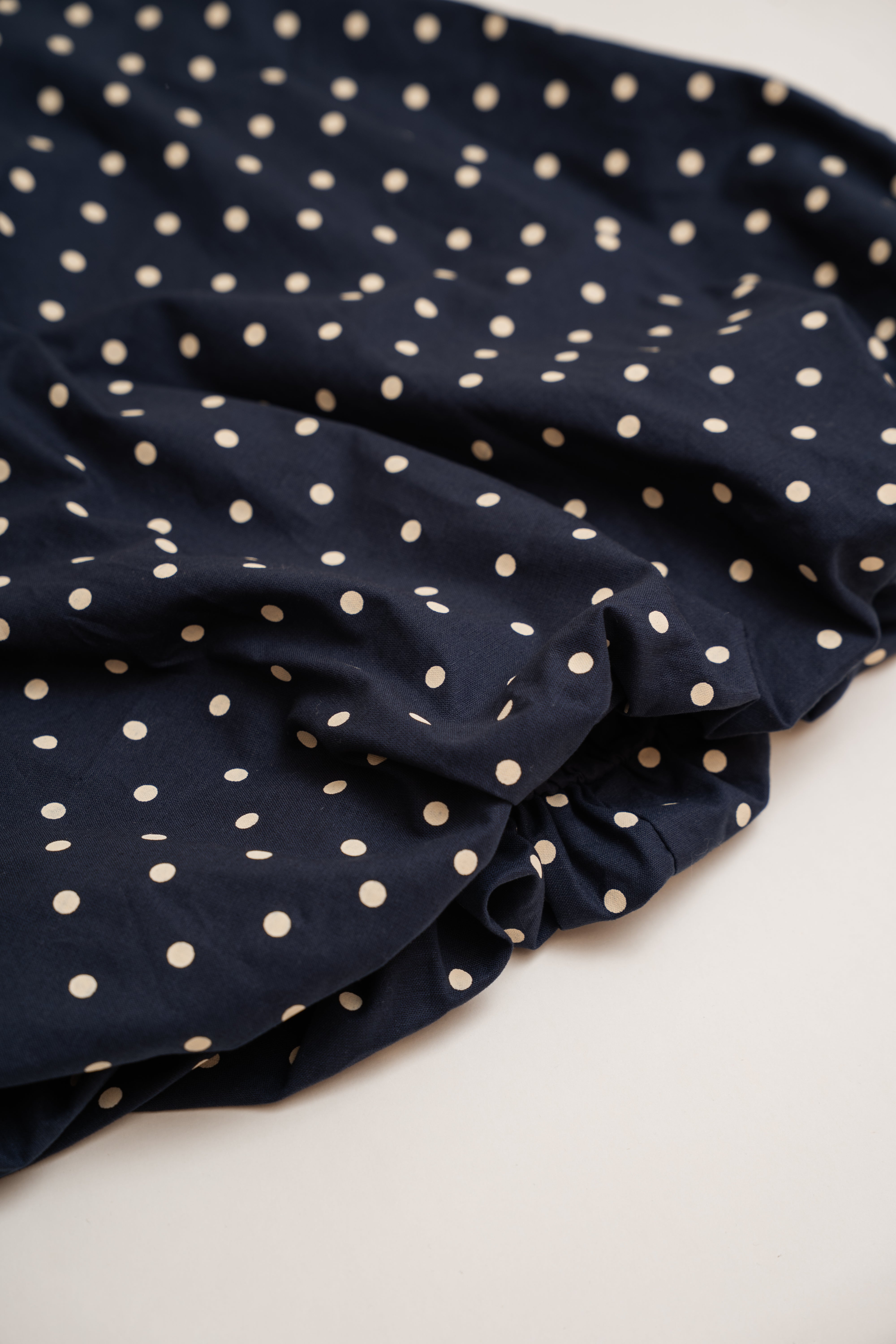 Mini Bubble Hem A-Line Dress in Polka Dot Navy