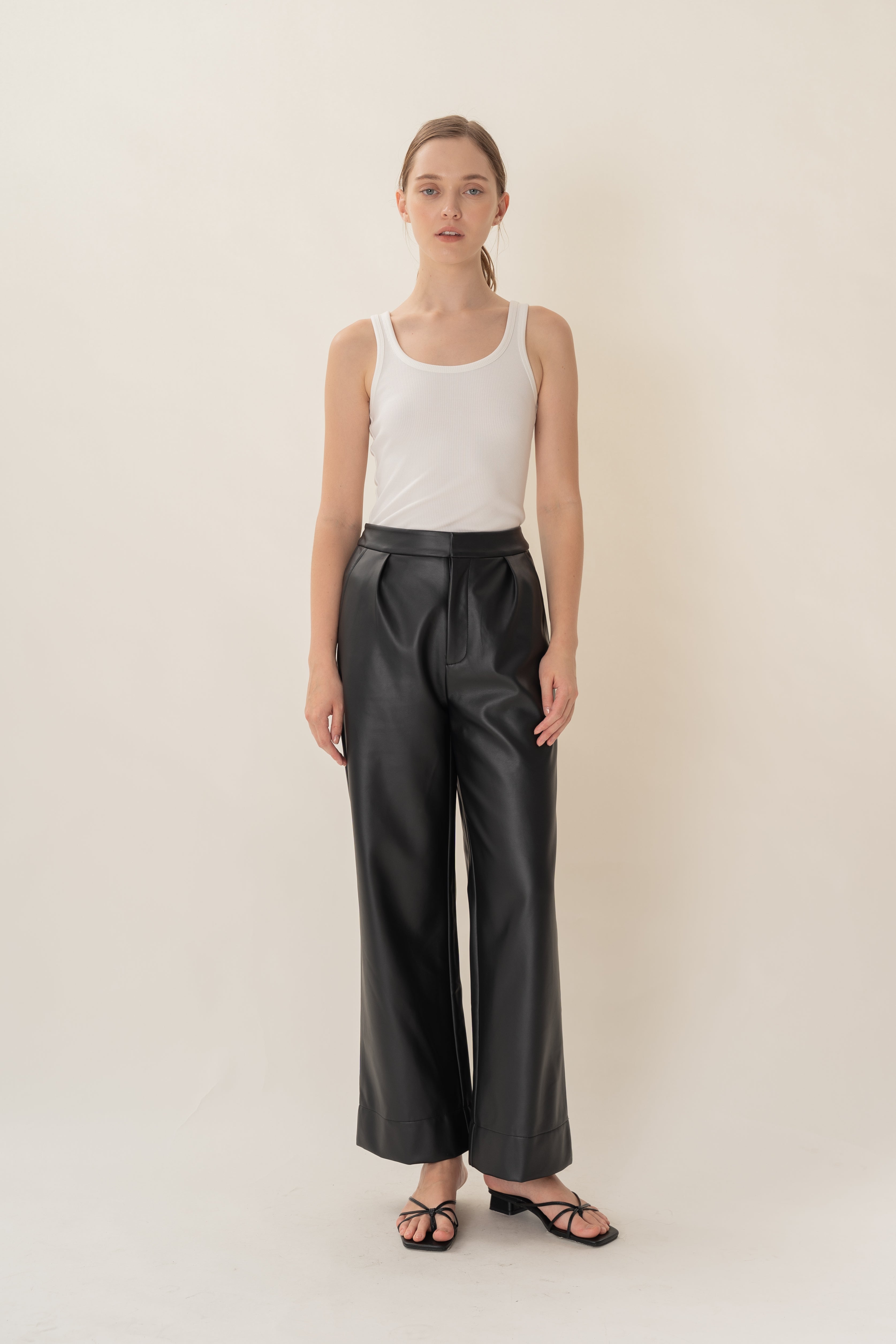 Faux Leather Pleated Trousers in Black