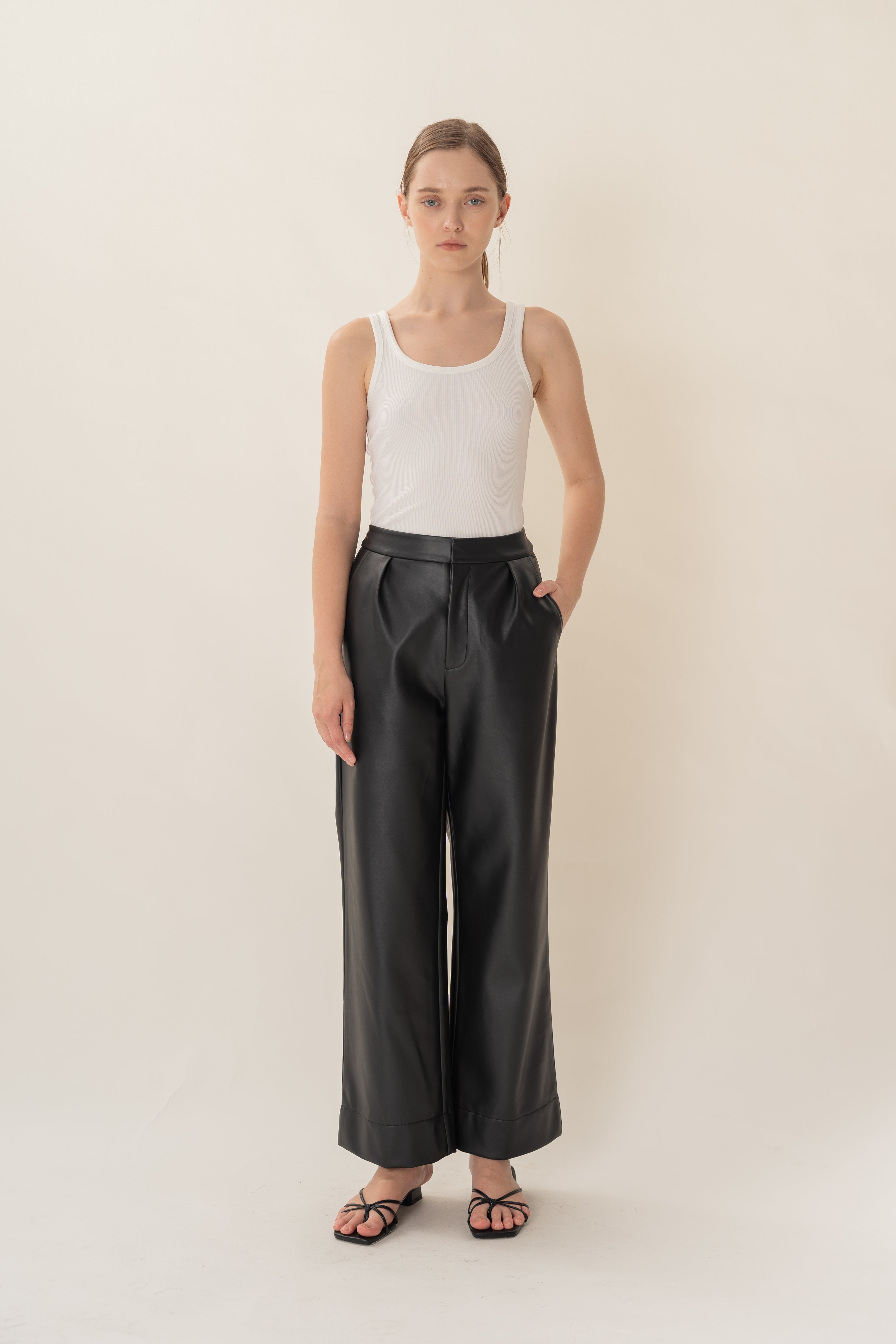 Faux Leather Pleated Trousers in Black