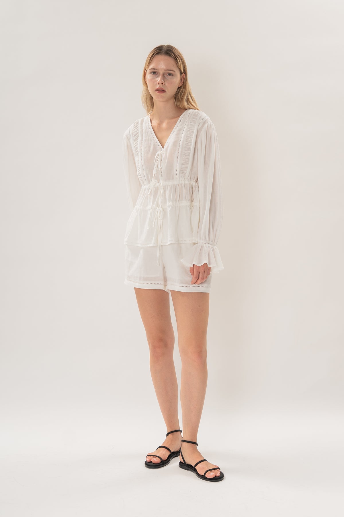 Textured Long Sleeve Blouse With Eyelet Detailing in White