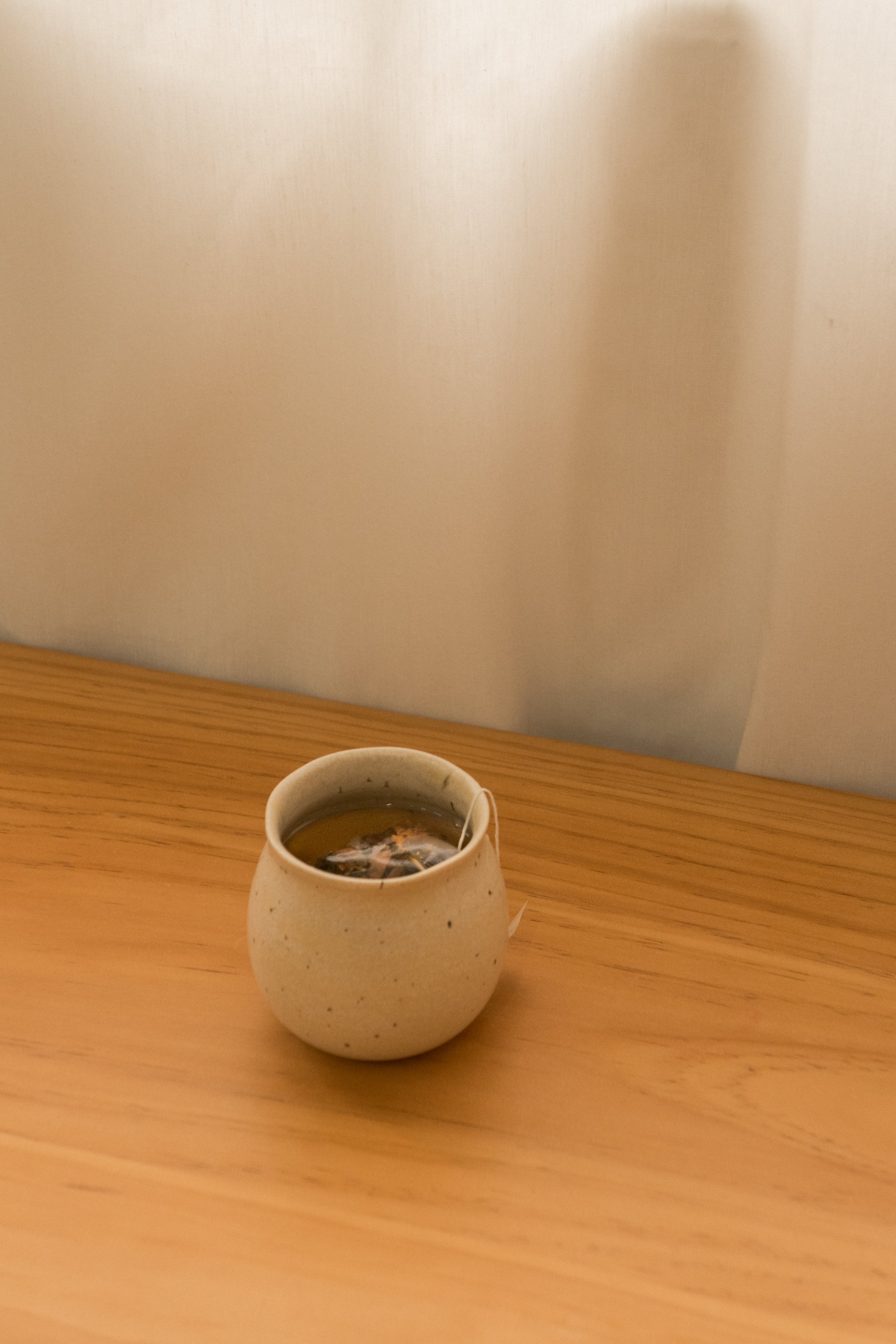 Bell-bottomed Cup with Organic Rim in Sandstone