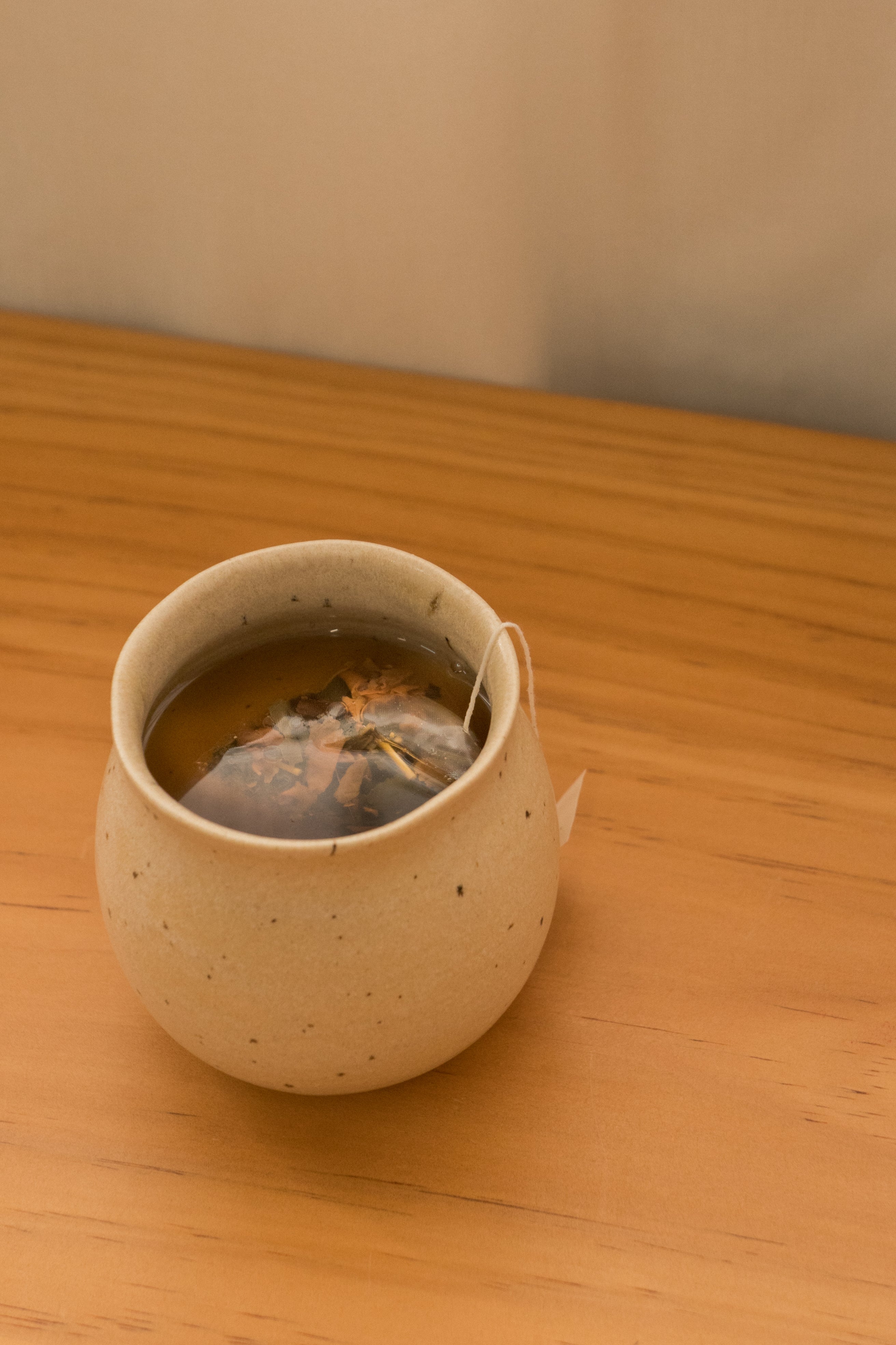 Bell-bottomed Cup with Organic Rim in Sandstone