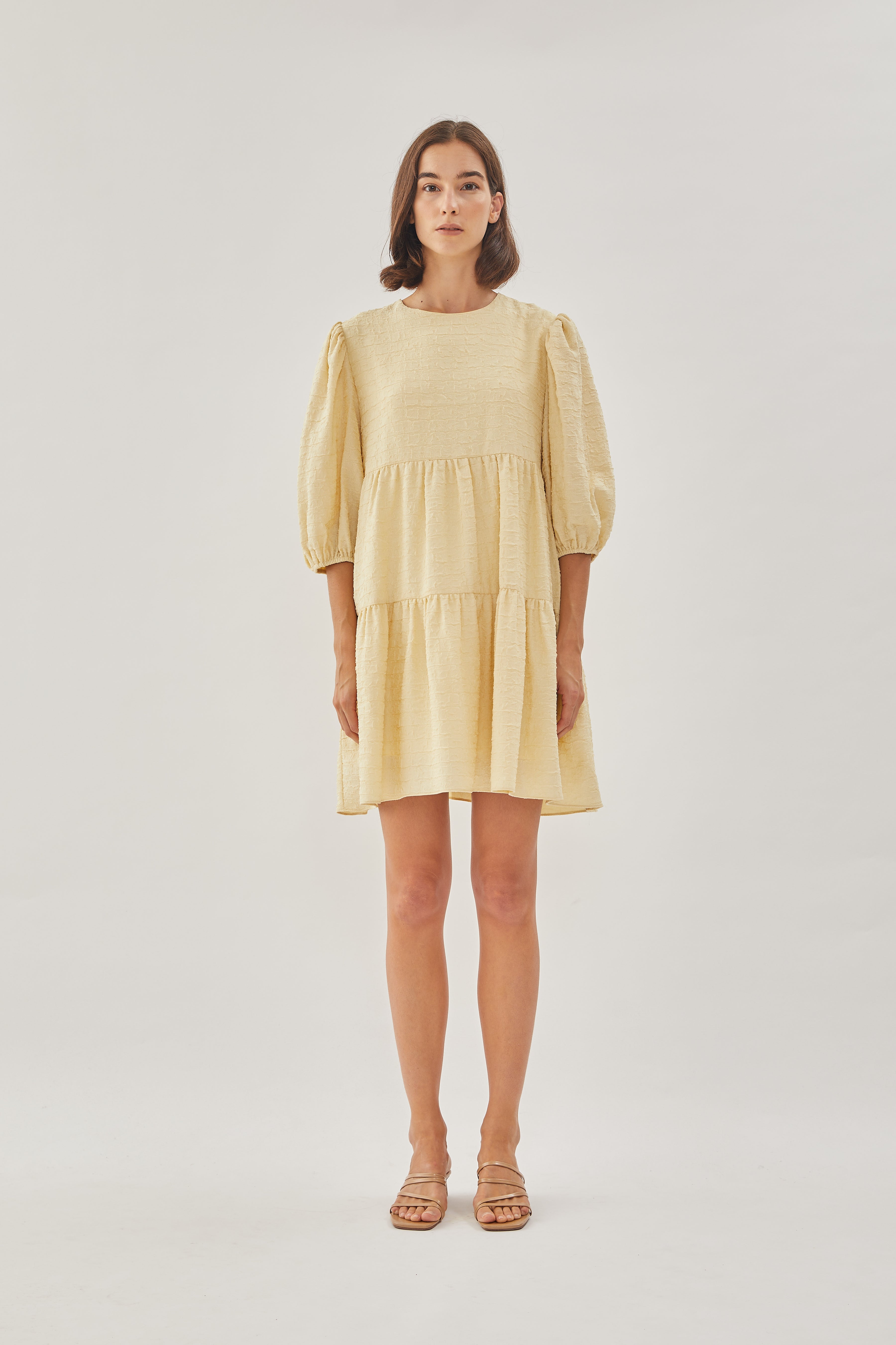 Textured Puffed Sleeved Mini Dress in Yellow