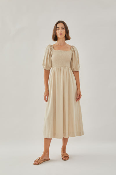 Puffed Sleeved Shirred Midi Dress in Sand – KLARRA