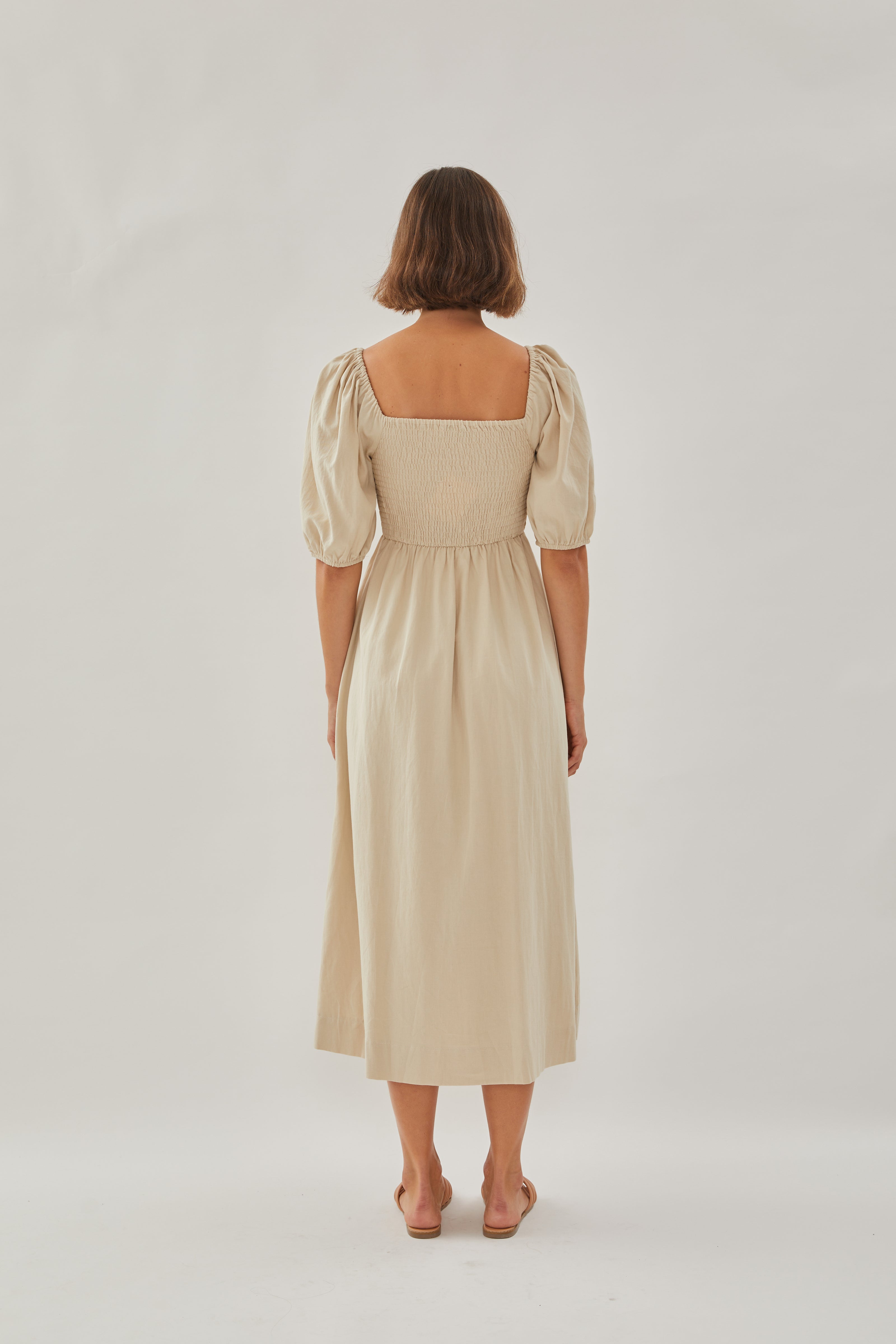 Puffed Sleeved Shirred Midi Dress in Sand