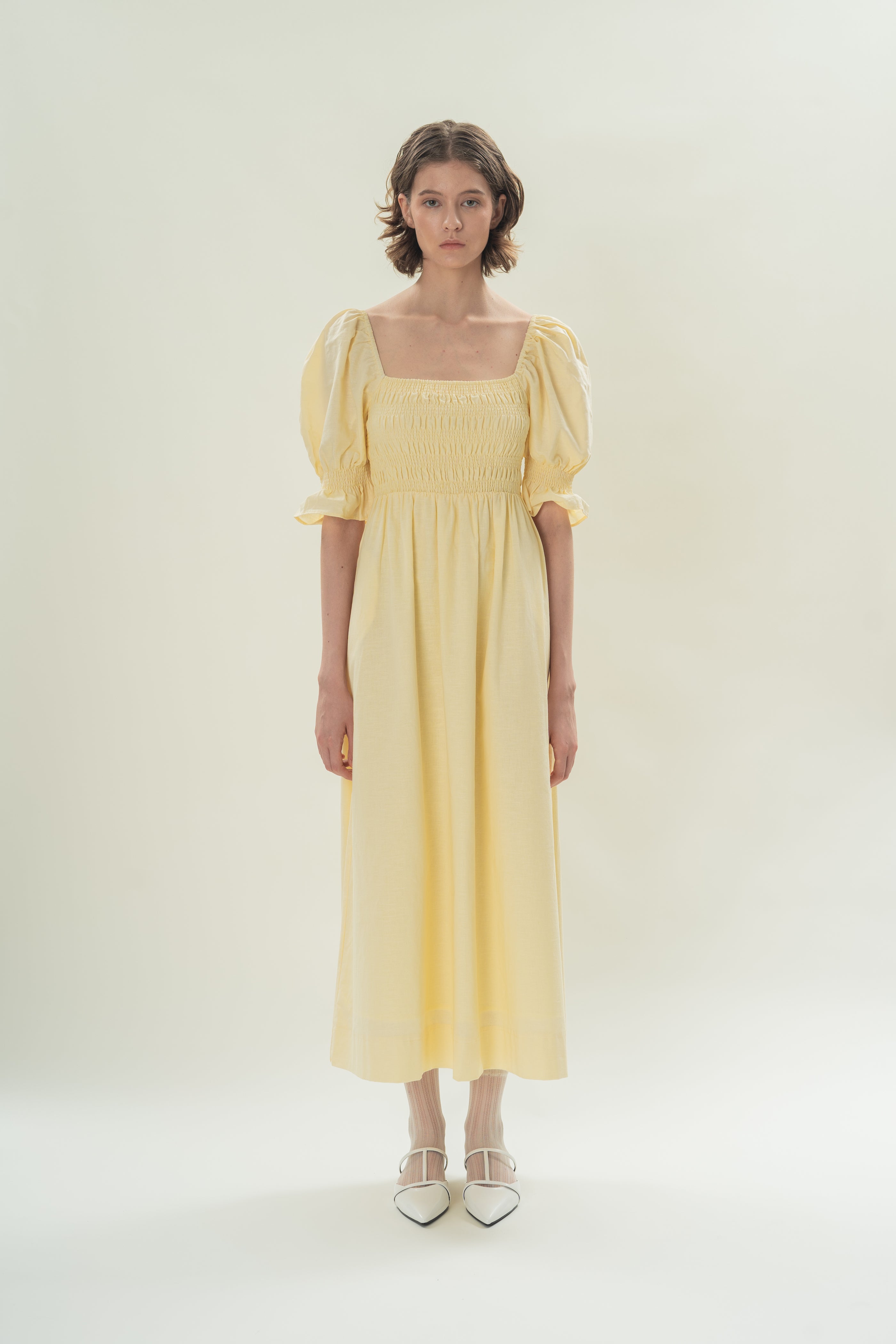 Puff Sleeve Midi Dress With Smocking Details in Eggnog