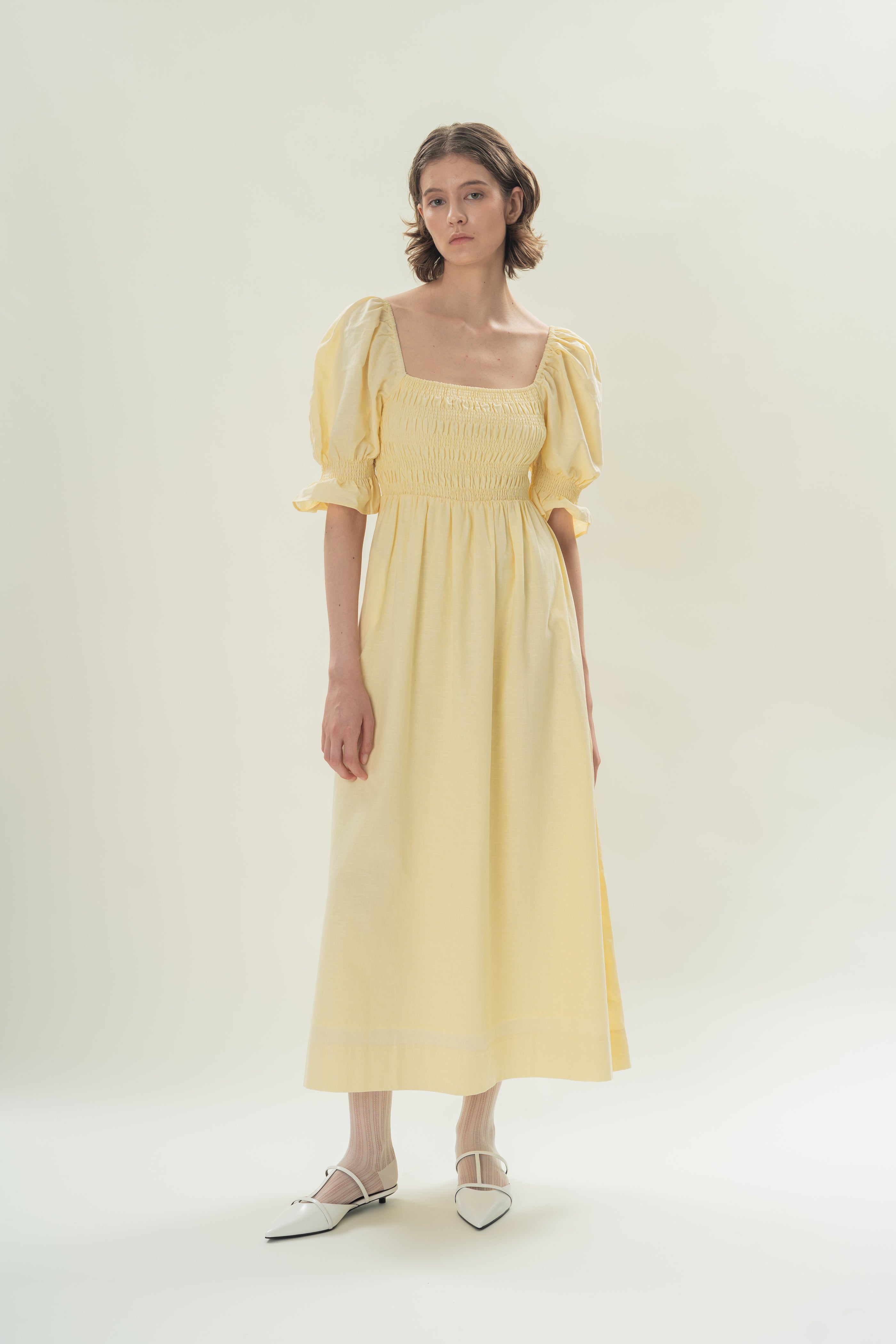 Puff Sleeve Midi Dress With Smocking Details in Eggnog