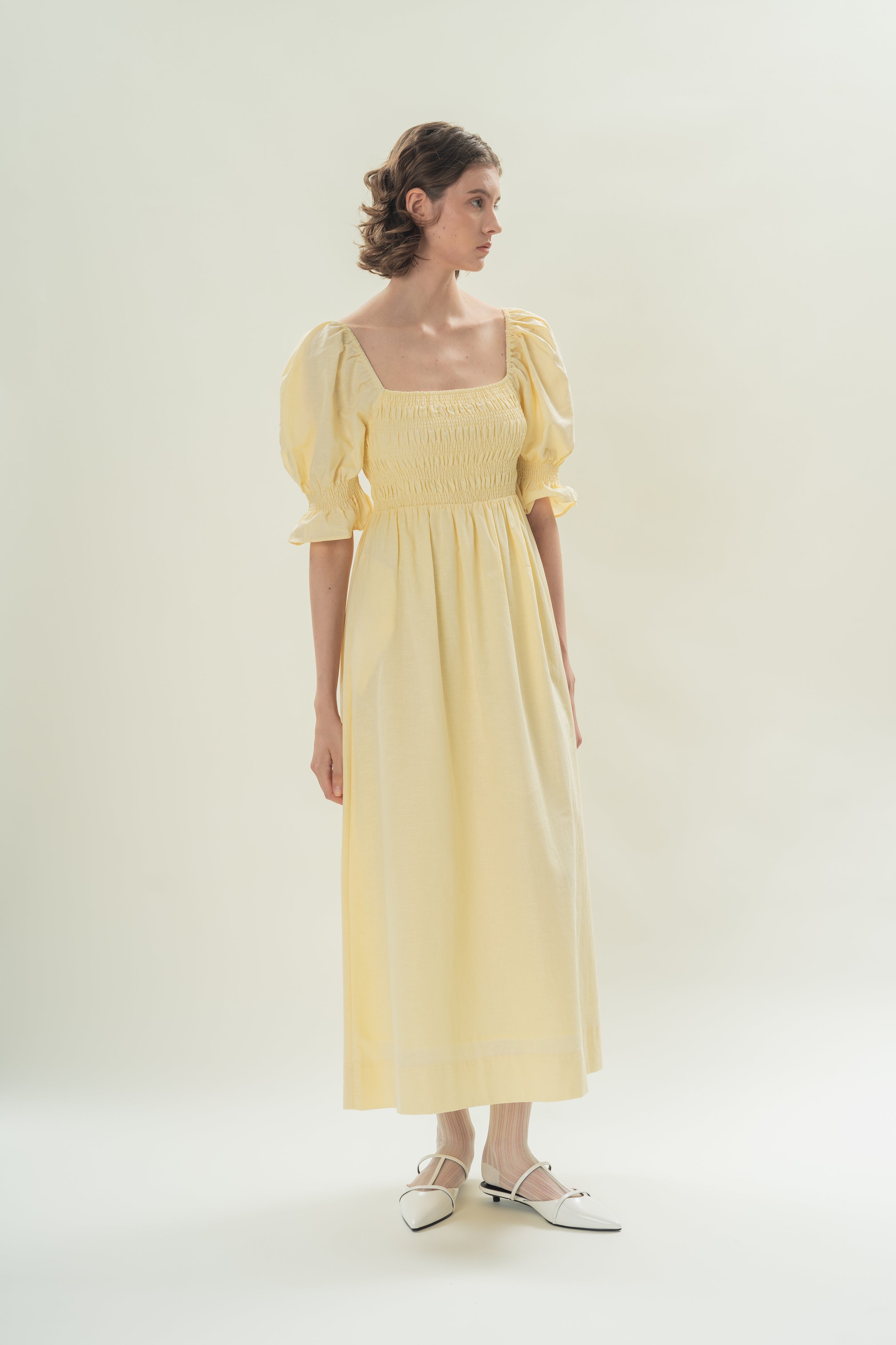 Puff Sleeve Midi Dress With Smocking Details in Eggnog