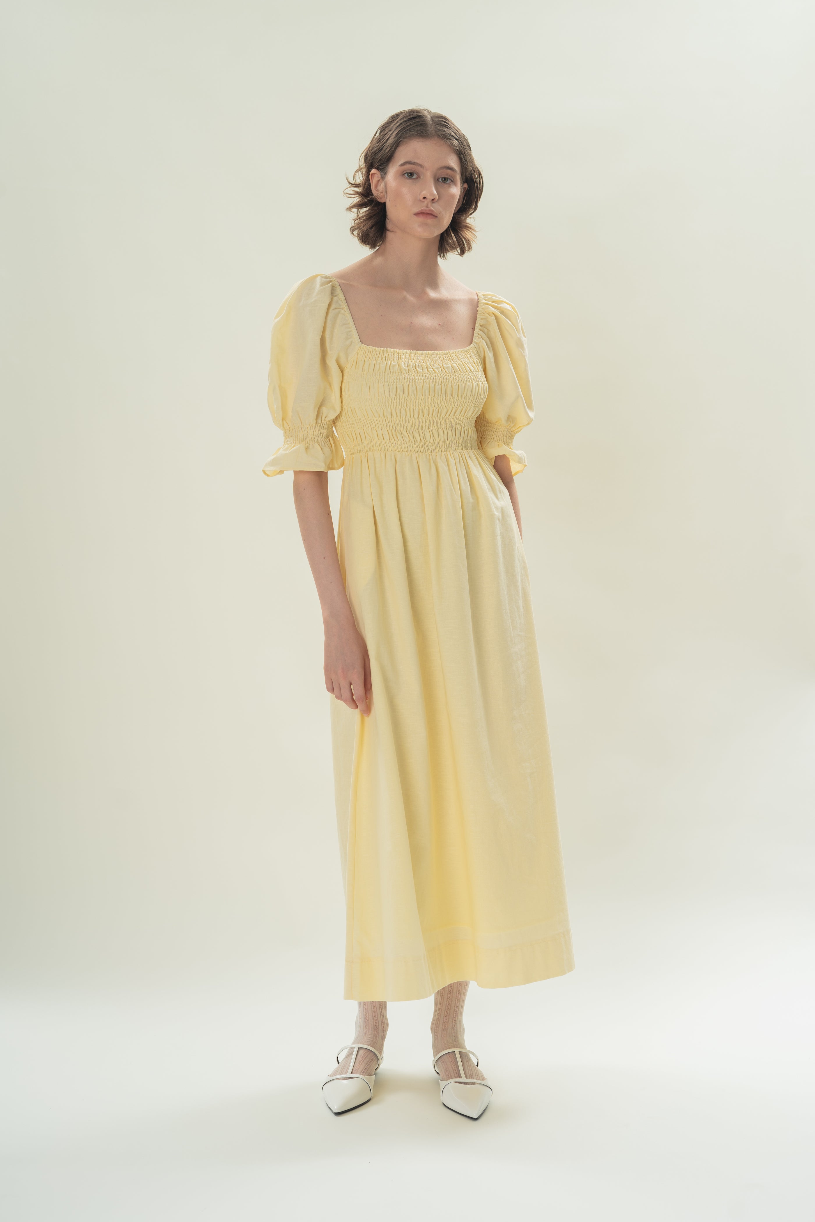 Puff Sleeve Midi Dress With Smocking Details in Eggnog