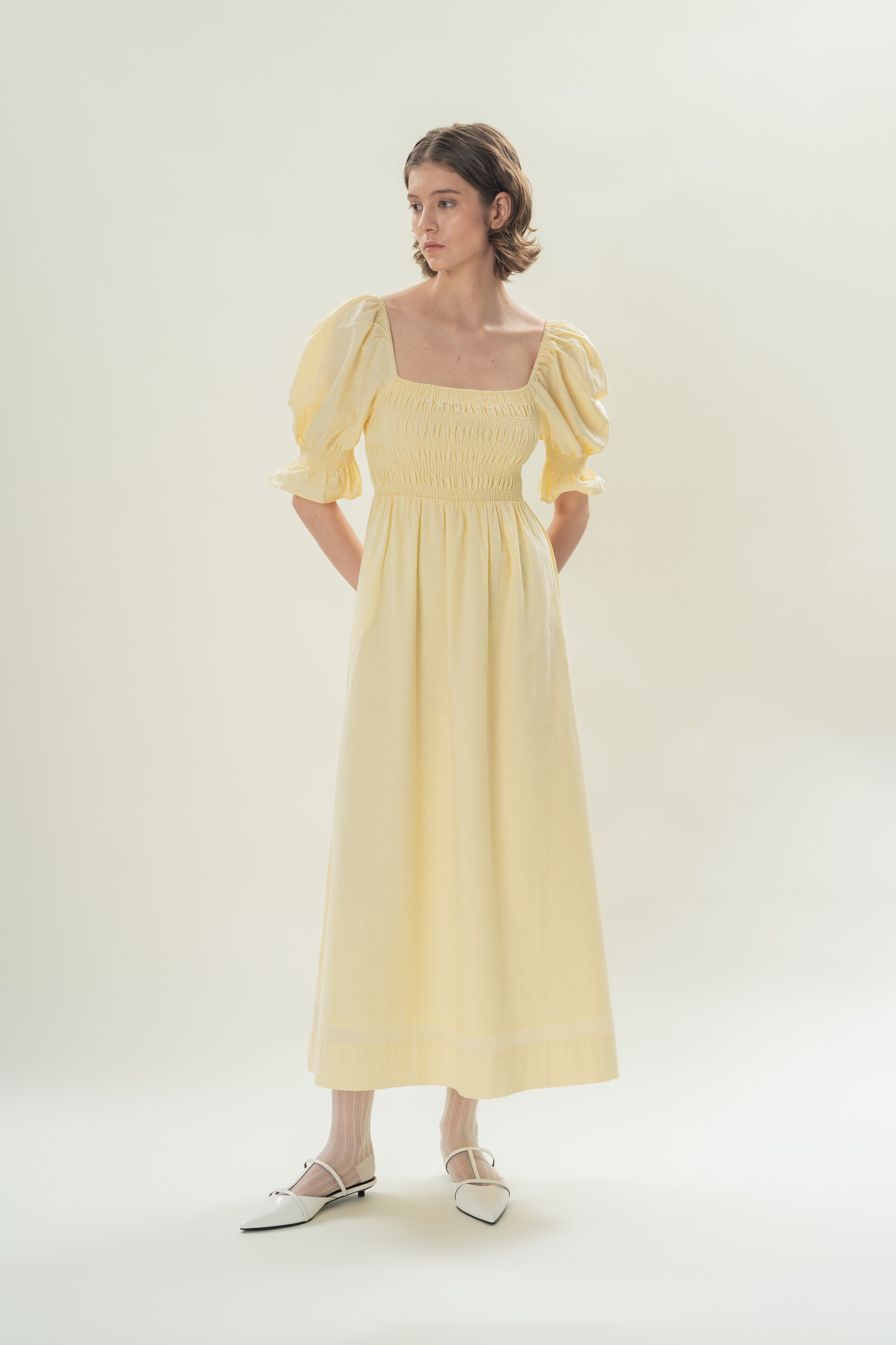 Puff Sleeve Midi Dress With Smocking Details in Eggnog