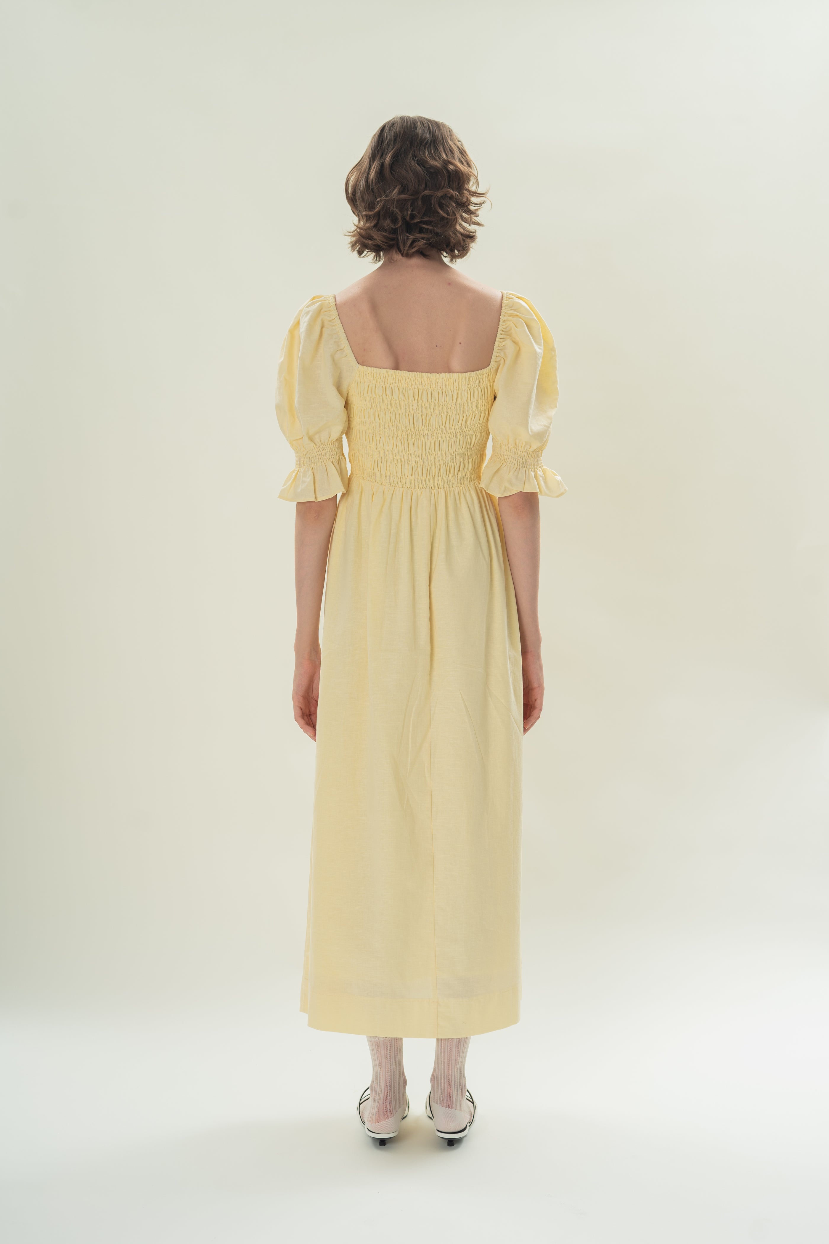 Puff Sleeve Midi Dress With Smocking Details in Eggnog