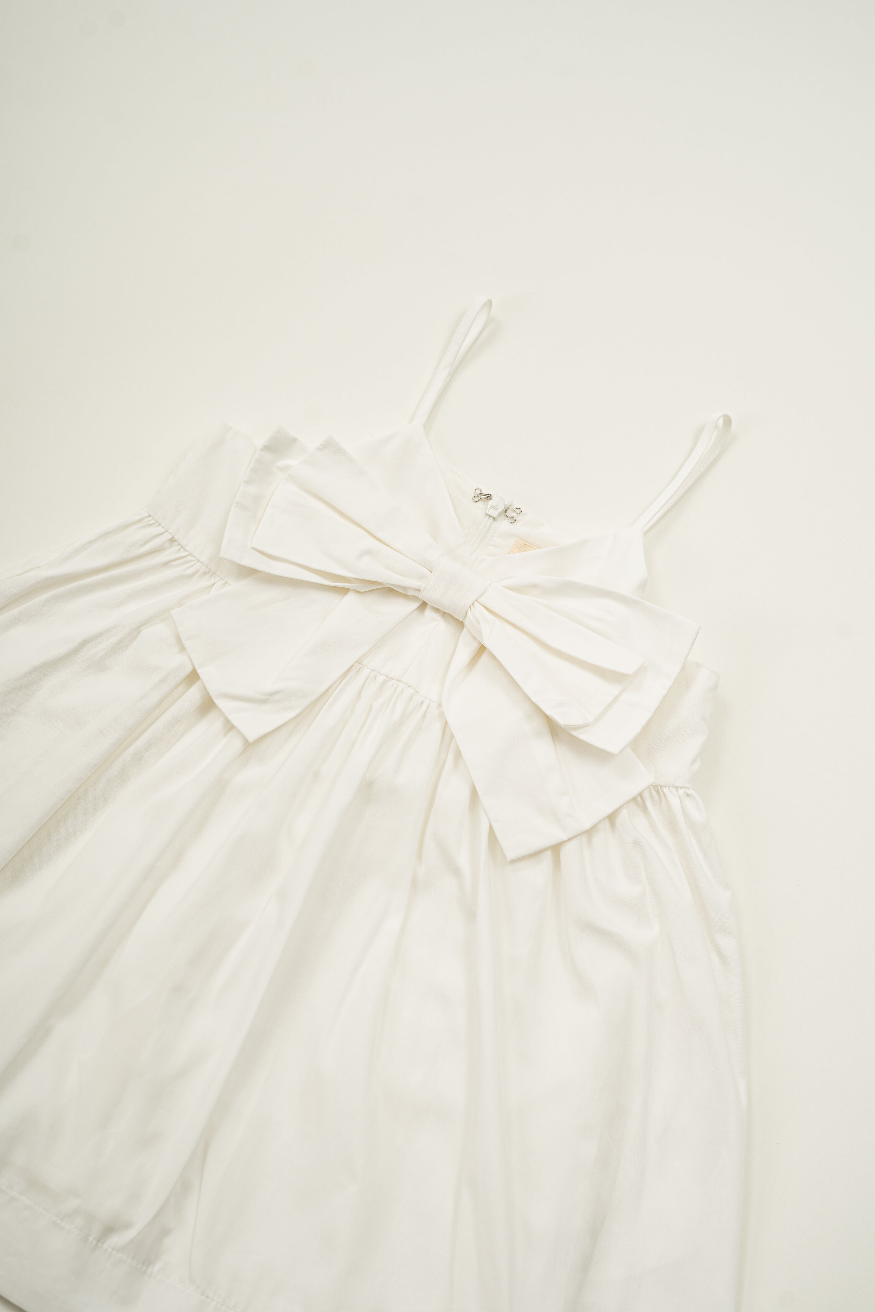 Mini Sleeveless Dress With Detachable Bow in White