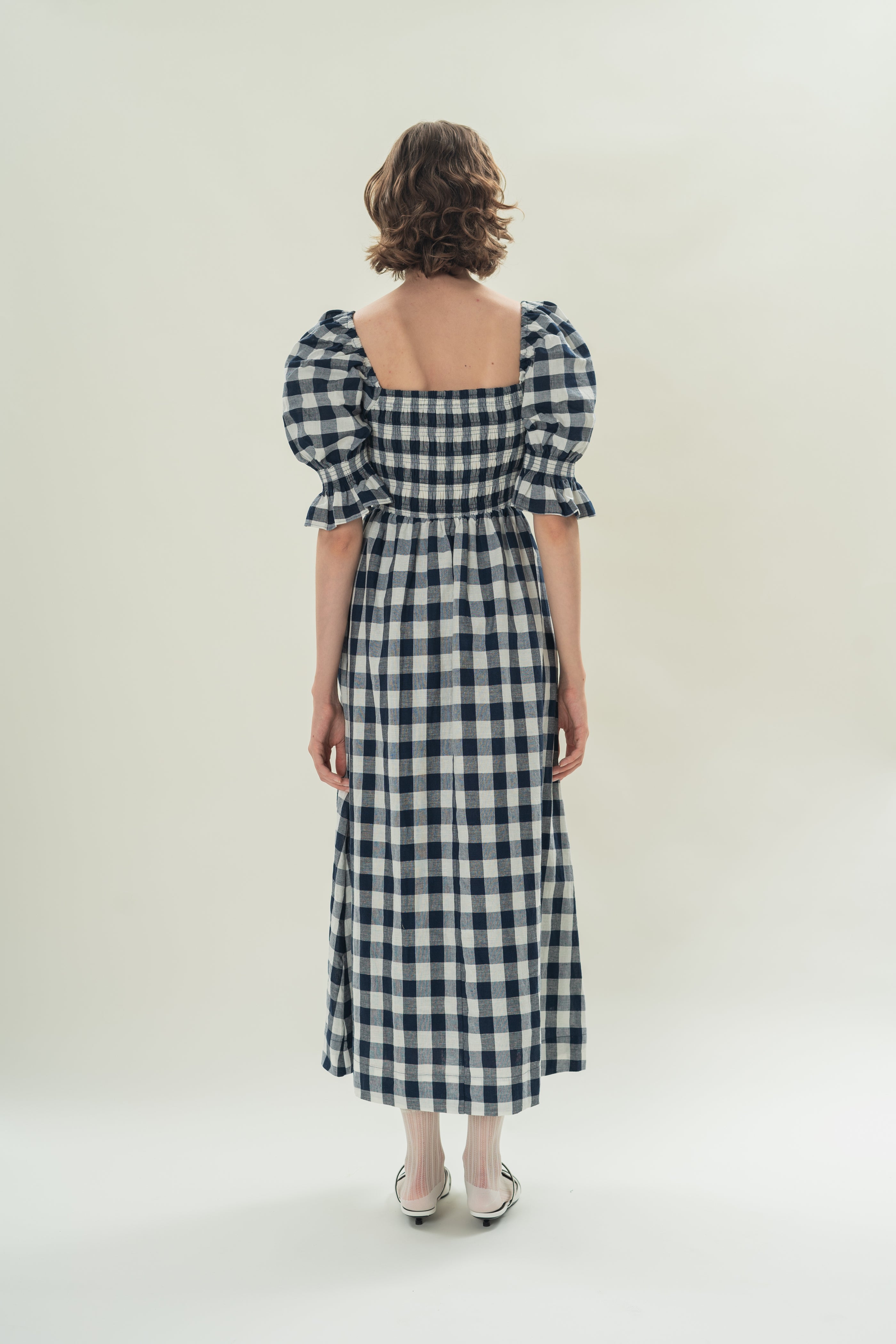 Puff Sleeve Midi Dress With Smocking Details in Navy Gingham