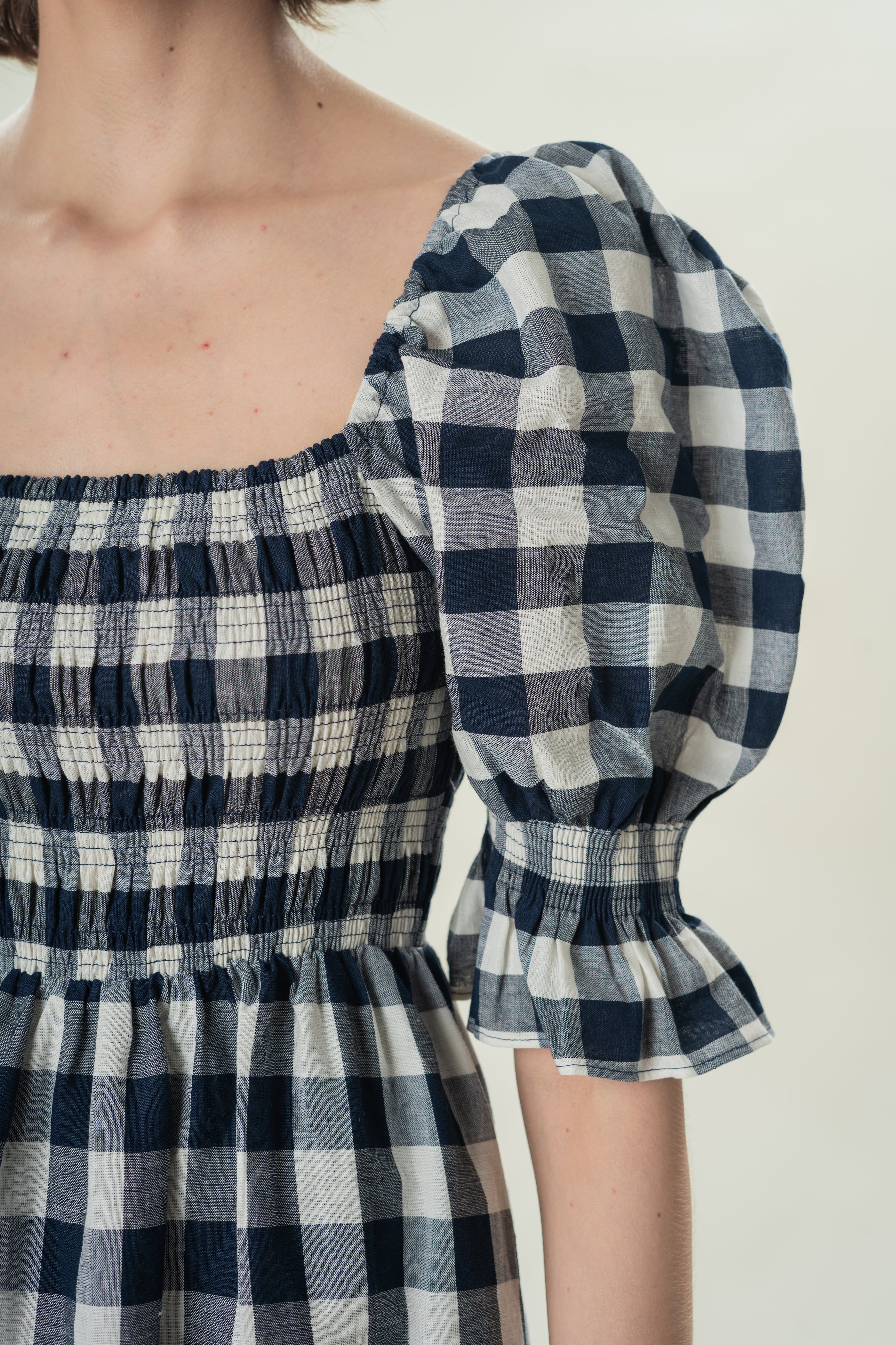 Puff Sleeve Midi Dress With Smocking Details in Navy Gingham