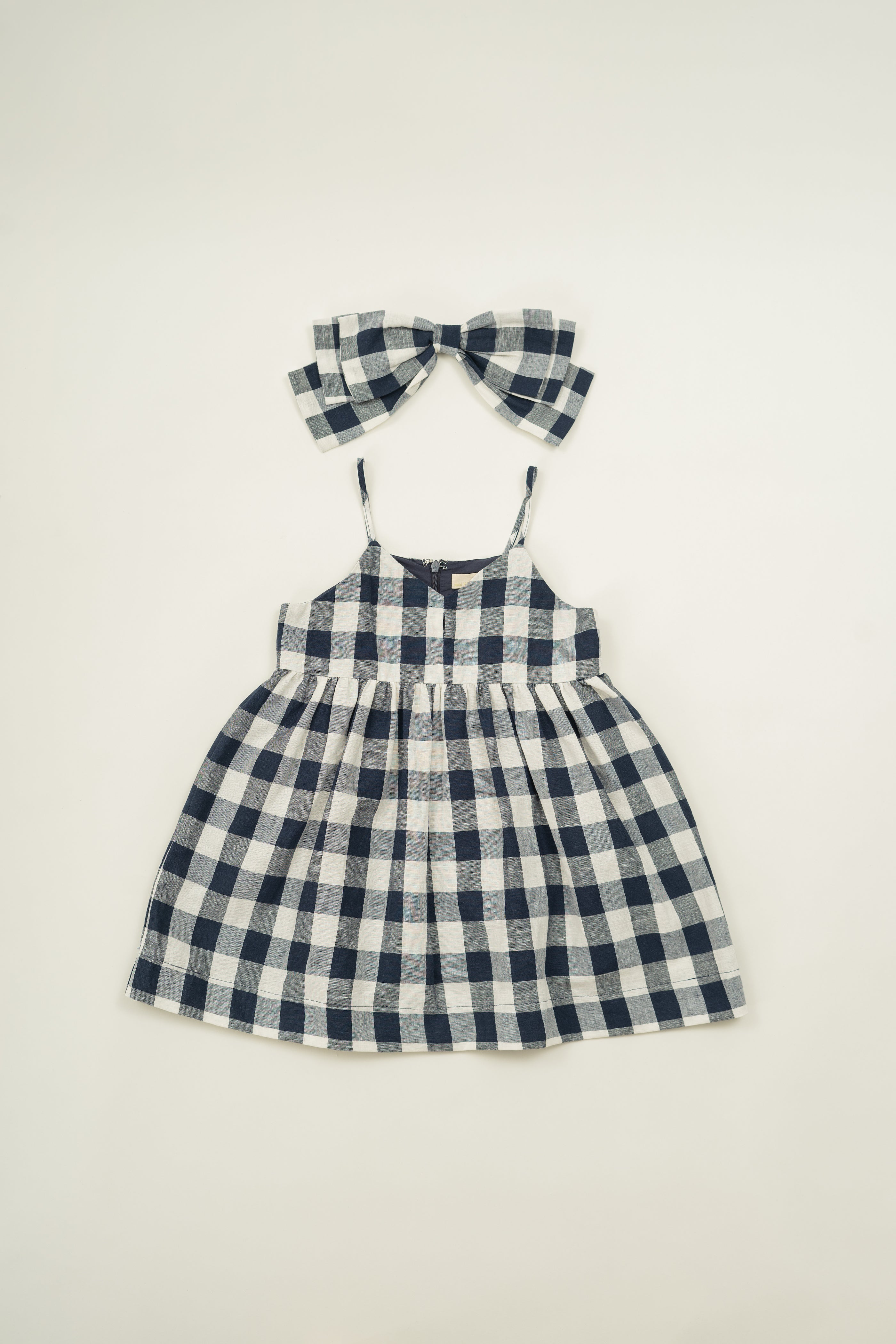 Mini Sleeveless Dress With Detachable Bow in Navy Gingham