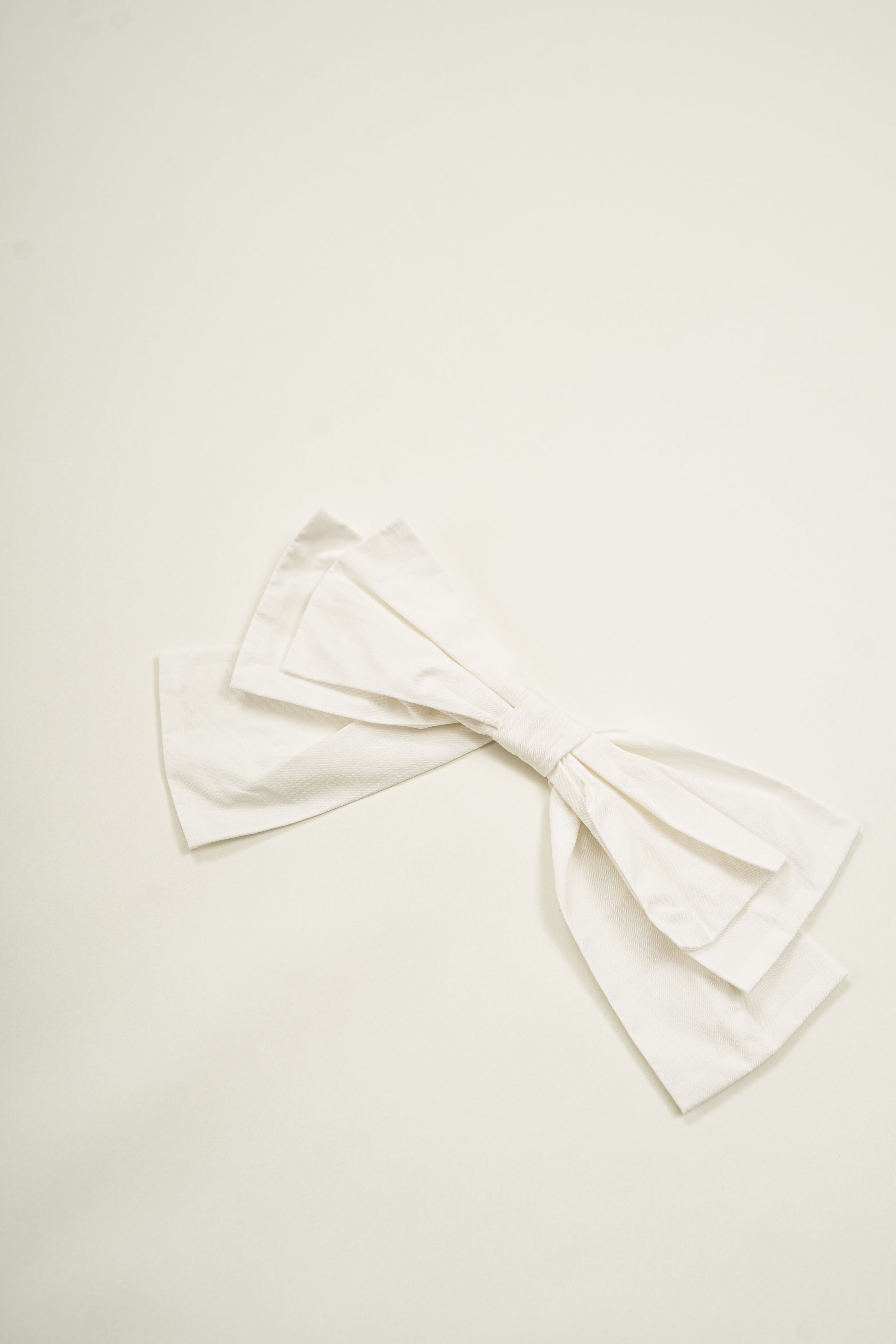 Mini Sleeveless Dress With Detachable Bow in White