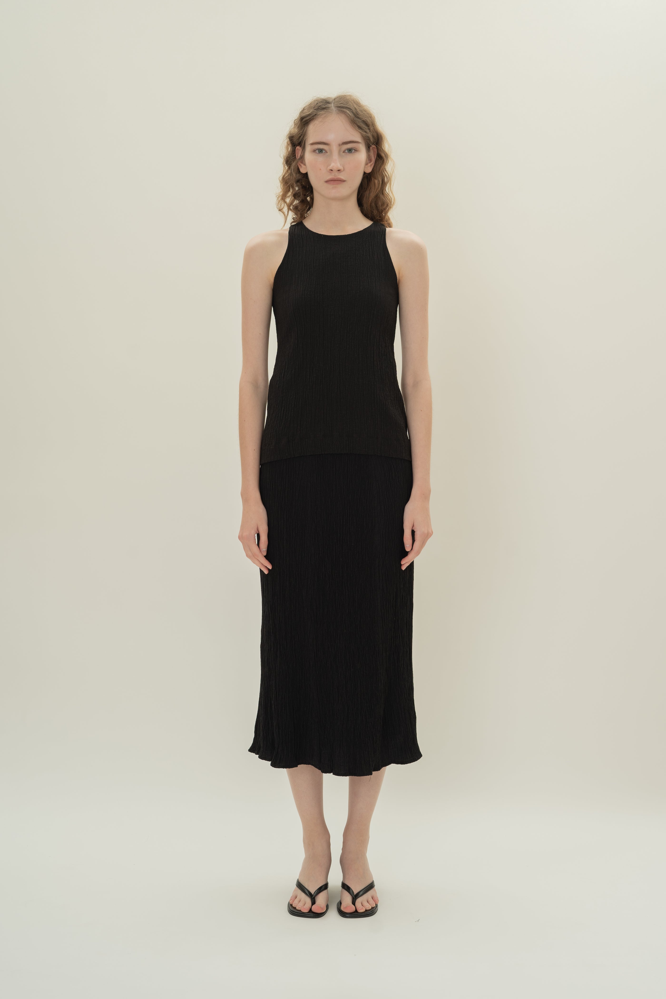 Cotton Blend Textured Round Neck Top in Black