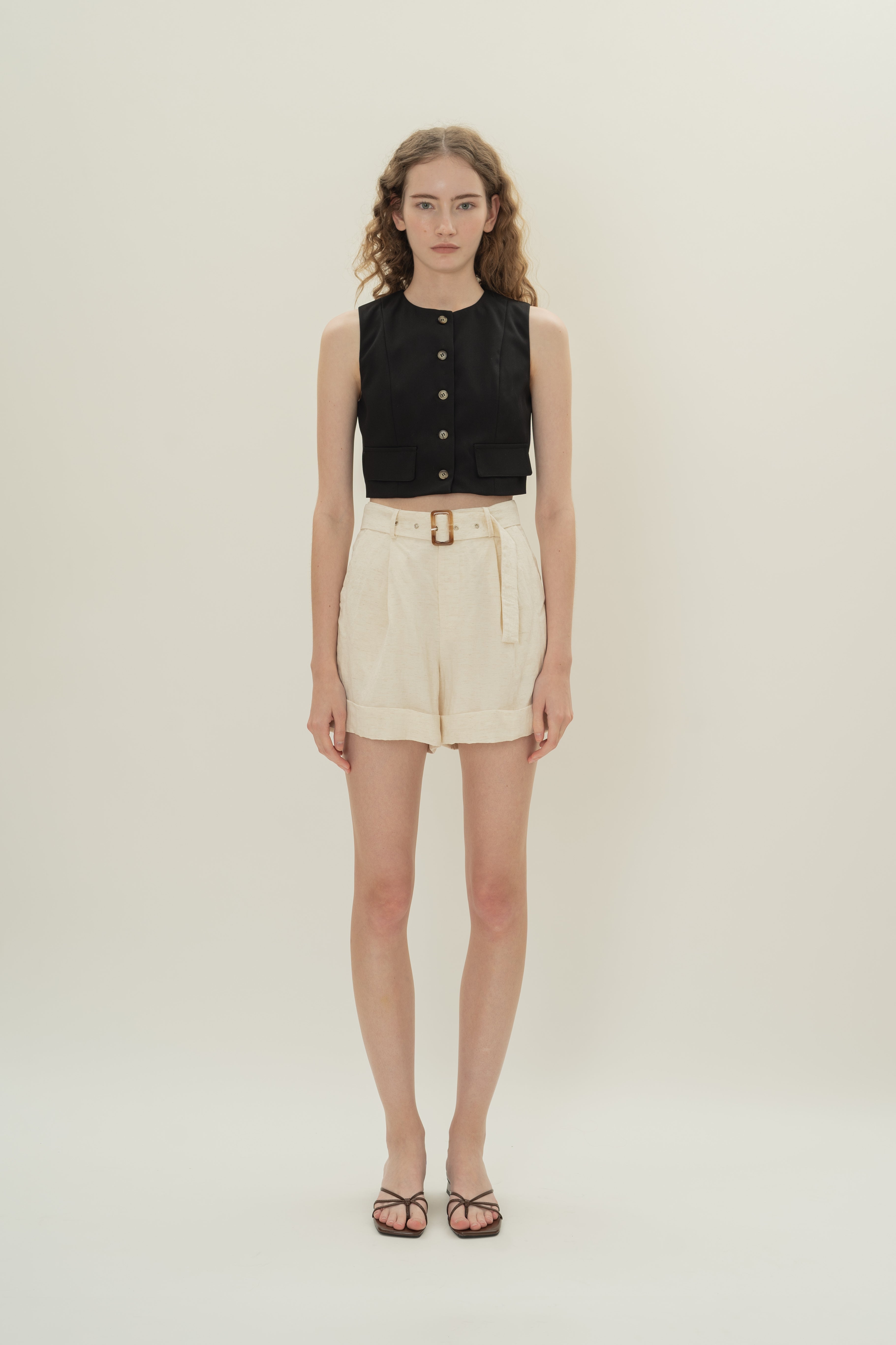 Collarless Sleeveless Top in Black