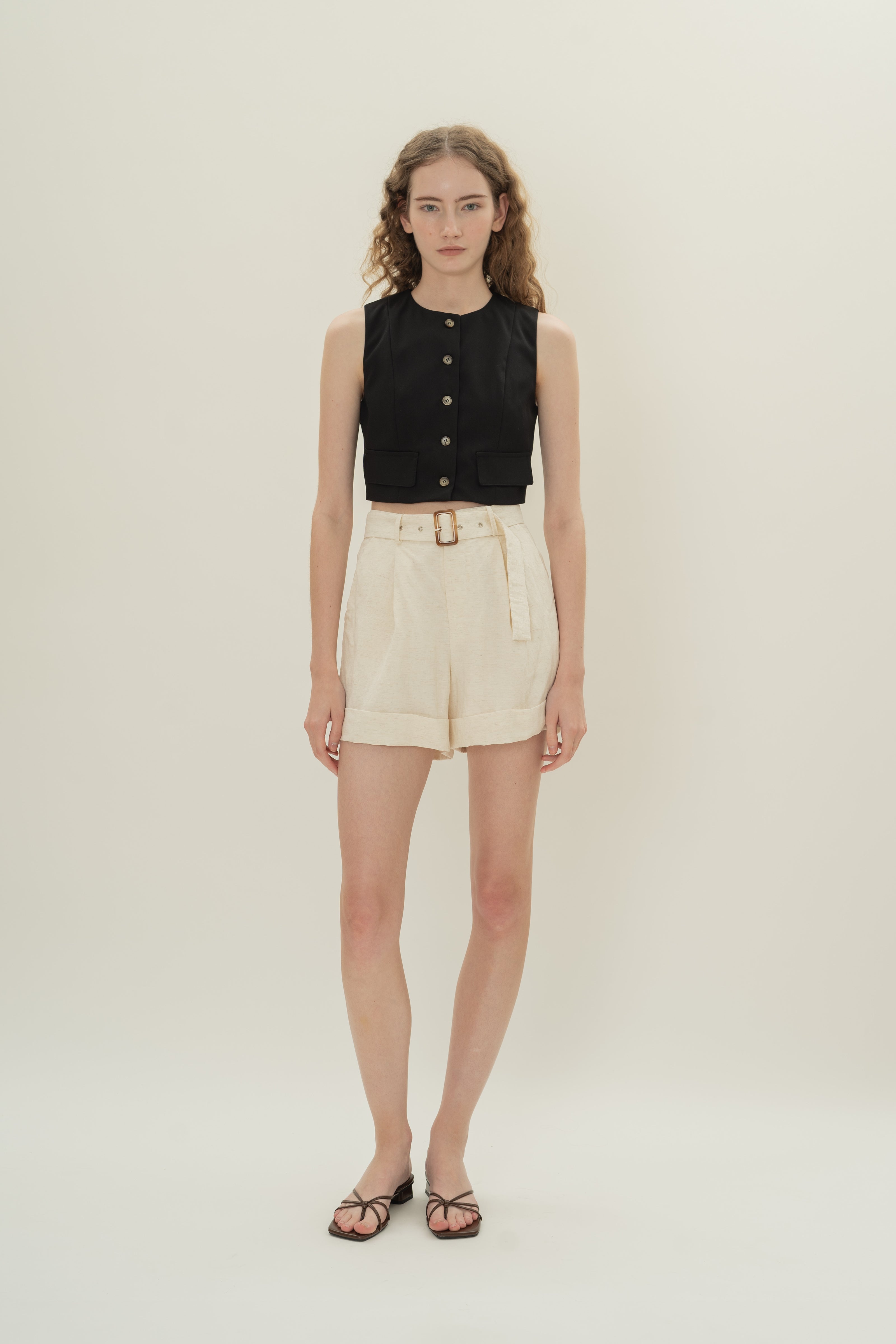 Collarless Sleeveless Top in Black