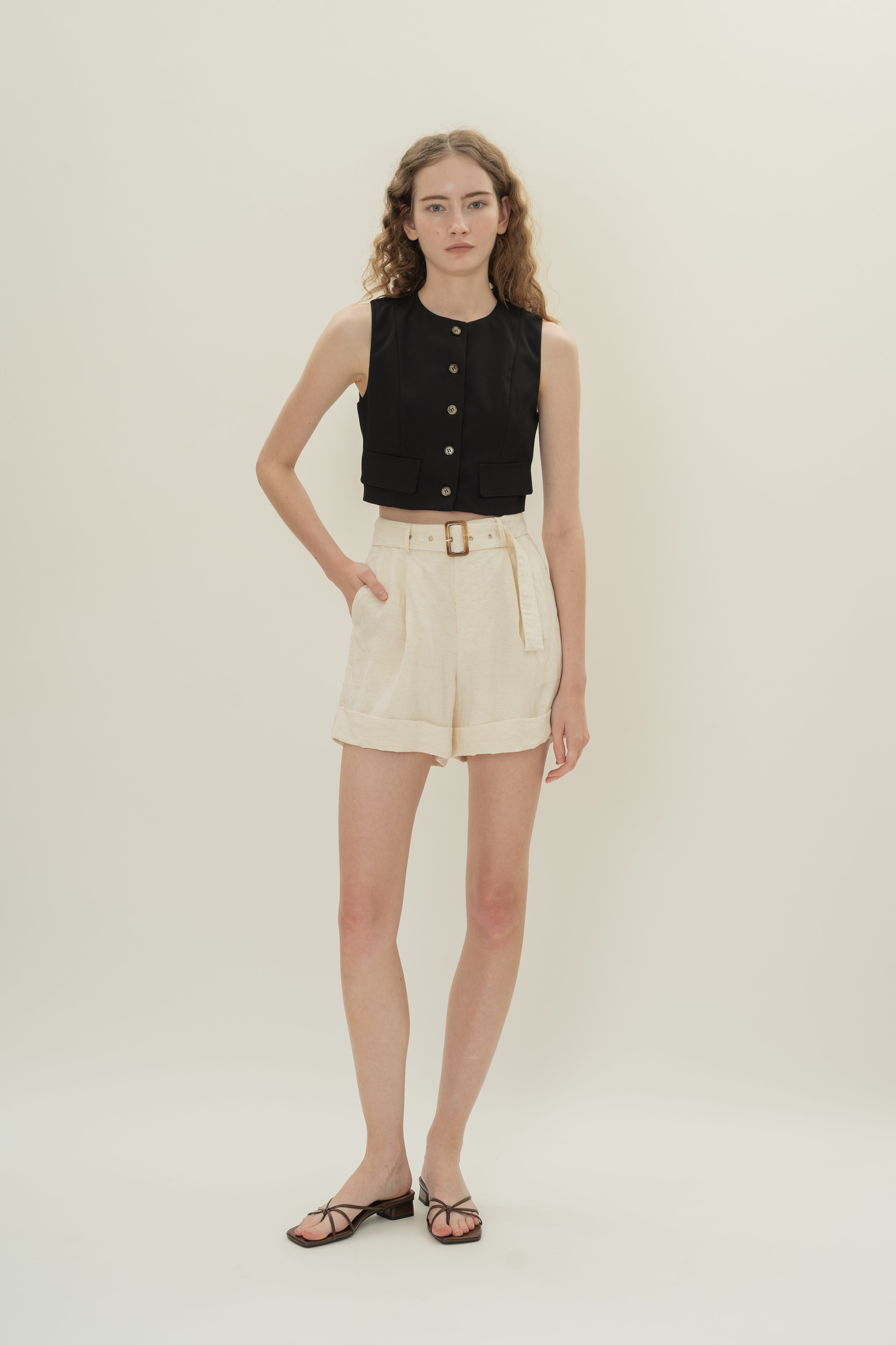 Collarless Sleeveless Top in Black